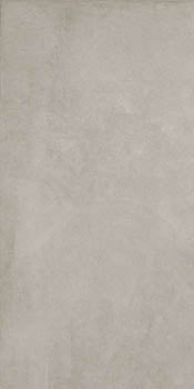 Matte silver-gray porcelain tile with soft 3D texture, evoking refined concrete elegance for modern luxury interiors.