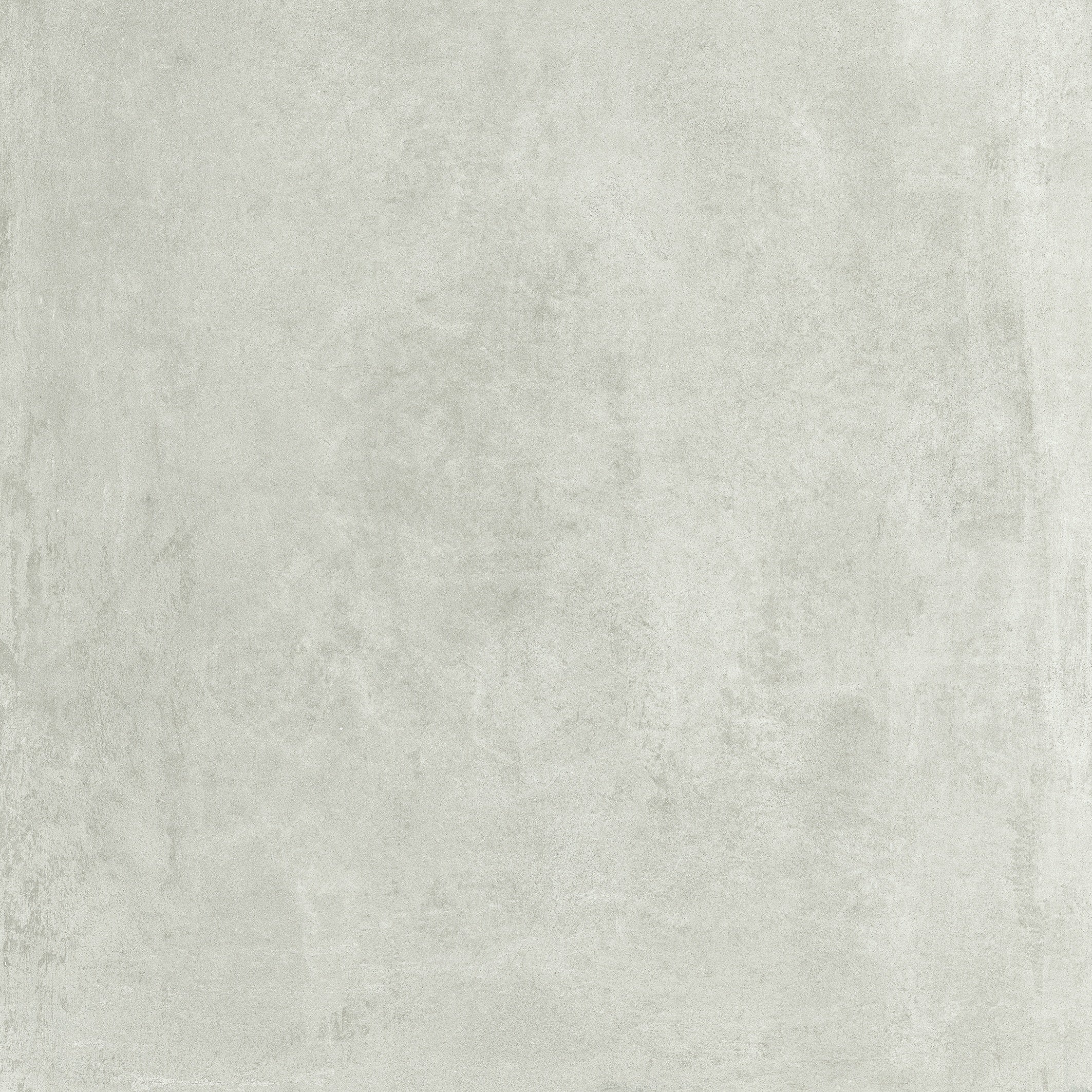 Large-format matte porcelain tile with soft textured concrete effect in refined white, exuding timeless industrial elegance.