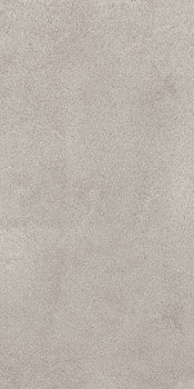 Matte silver-gray porcelain tile with a soft bush-hammered texture, evoking timeless industrial elegance and serene concrete warmth.