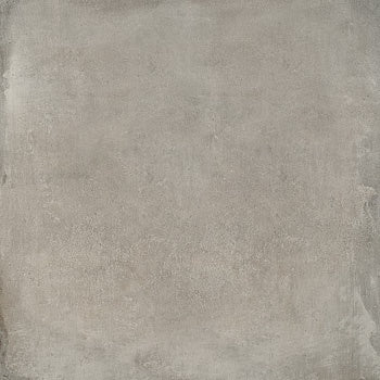 Minimalist beige porcelain tile with industrial concrete texture, warm matte finish, and refined rectified edges for modern luxury spaces.