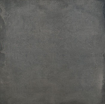 Matte black porcelain tile with industrial concrete elegance, rectified edges, and a warm minimalist aesthetic for refined modern spaces.