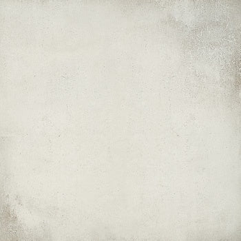 Minimalist white porcelain tile with a soft matte concrete finish, blending industrial edge with warm, refined elegance.