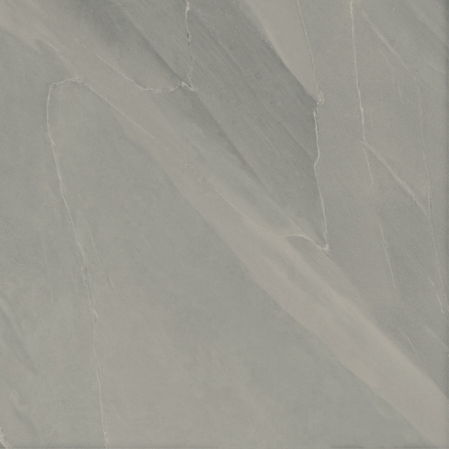 Elegant full-body porcelain tile with volcanic slate texture in soft gray, evoking Iceland's raw, matte-finish luxury.