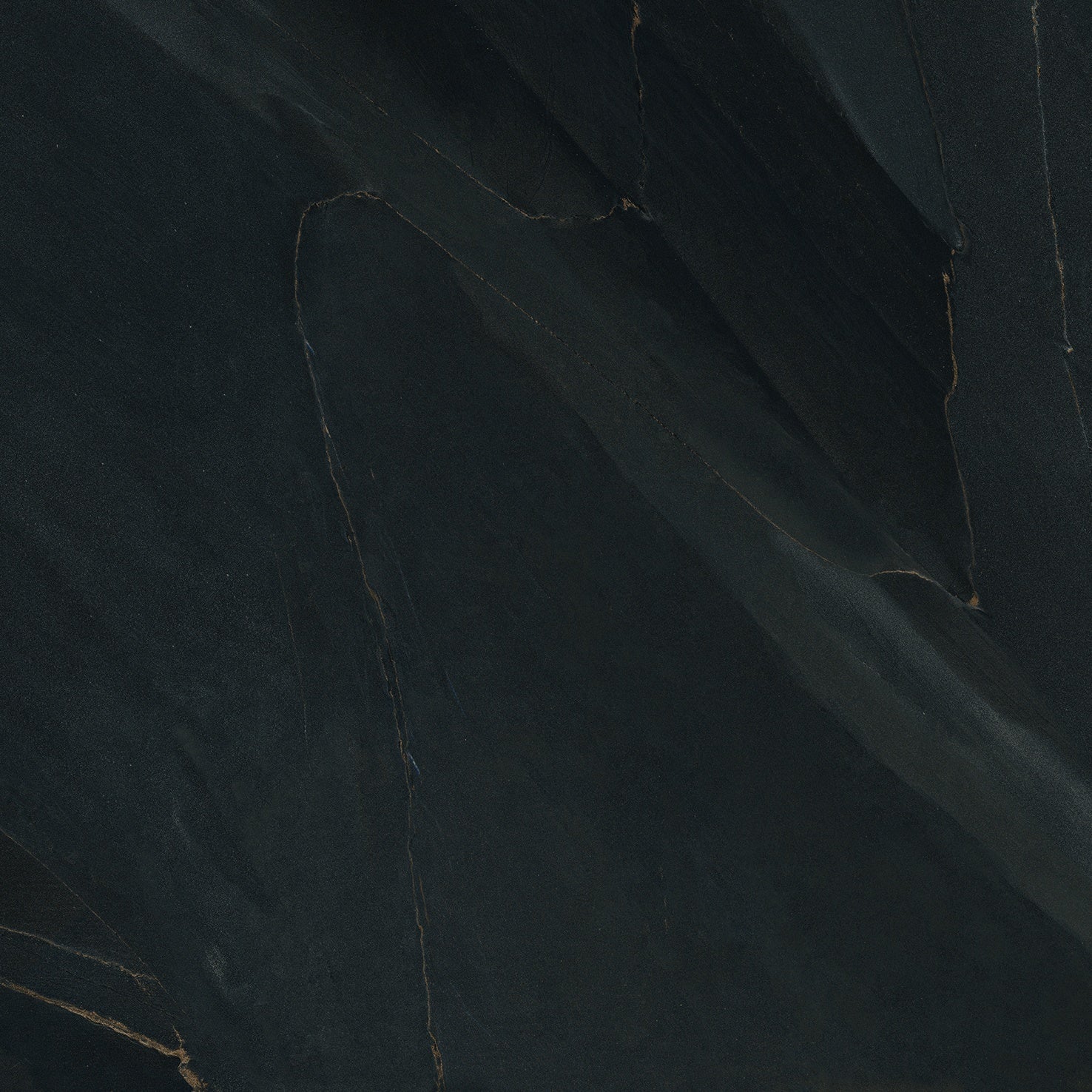 Black volcanic slate-look porcelain tile with a matte, textured surface and refined rectified edges, evoking Iceland's raw elegance.