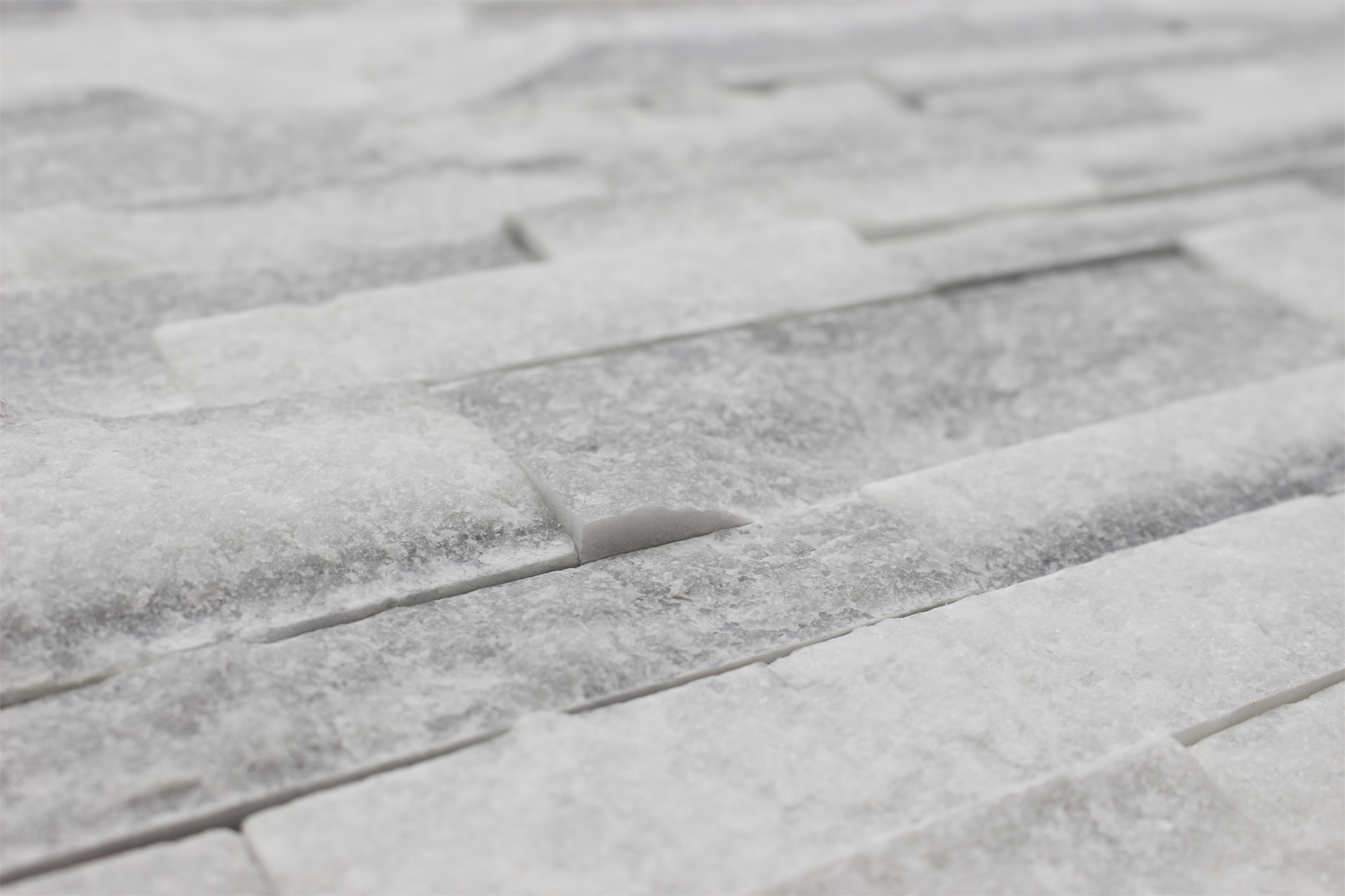 MILAS WHITE: Marble Ledgestone Wall Panel (6"x24"x3/4"-1" | splitface | chiseled)