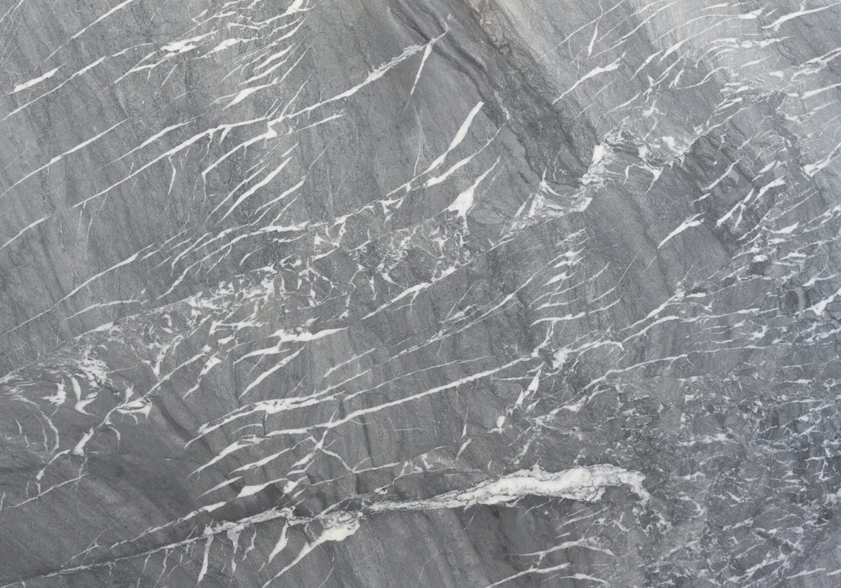Marble Slabs Blue De Savoie Dark marble slabs, top-down product view. Premium marble for floors and walls.