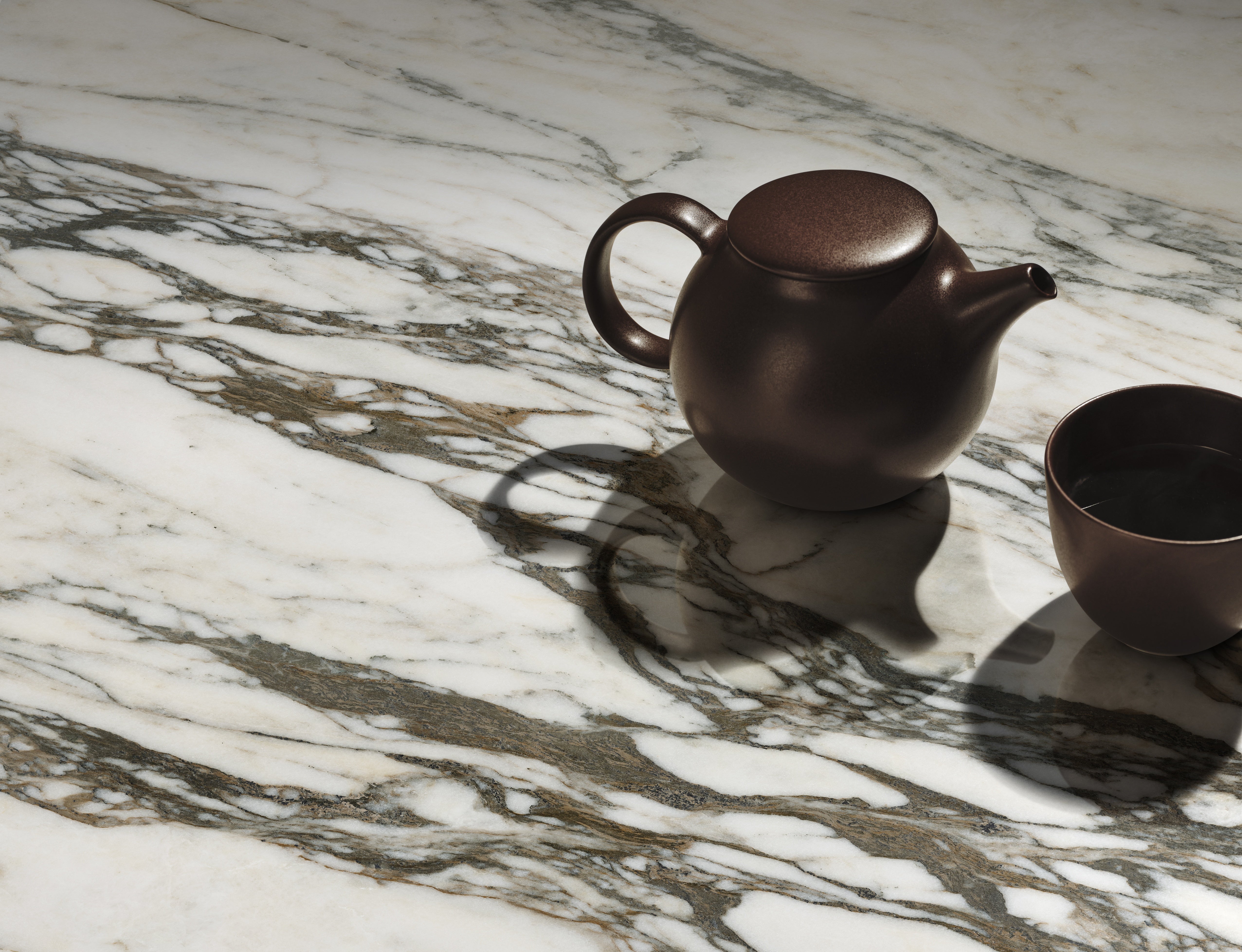 Calacatta Picasso slabs by Anatolia Aeterna, top-down product view, 63 25/32"×126 25/32" size. Premium porcelain for floors and walls.