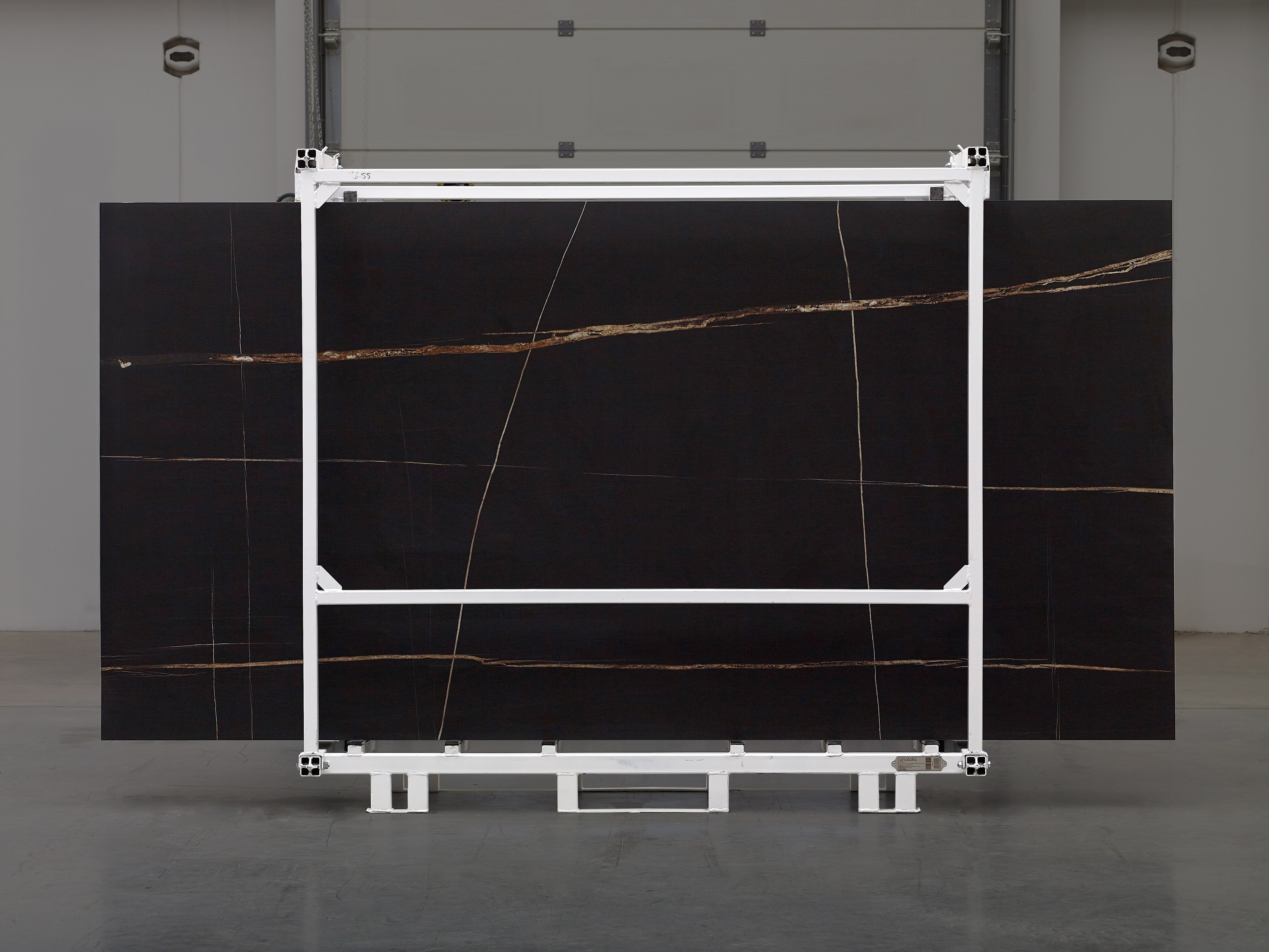 Majesto Sahara Noir sintered stone slabs by Anatolia, top-down product view, 64"×127"×15/32" size. Turkish sintered stone for floors and walls.