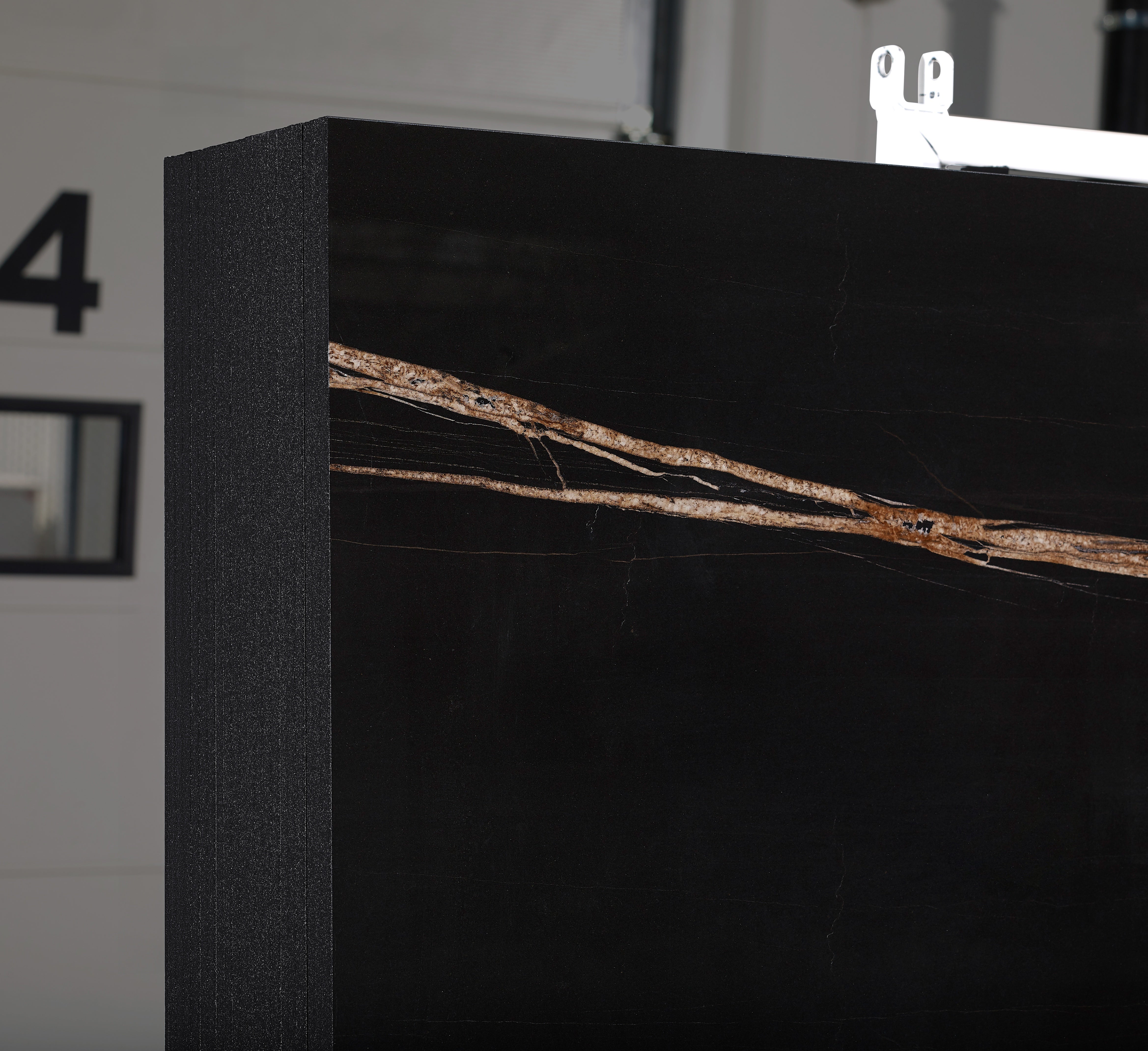 Majesto Sahara Noir sintered stone slabs by Anatolia, top-down product view, 64"×127"×15/32" size. Turkish sintered stone for floors and walls.