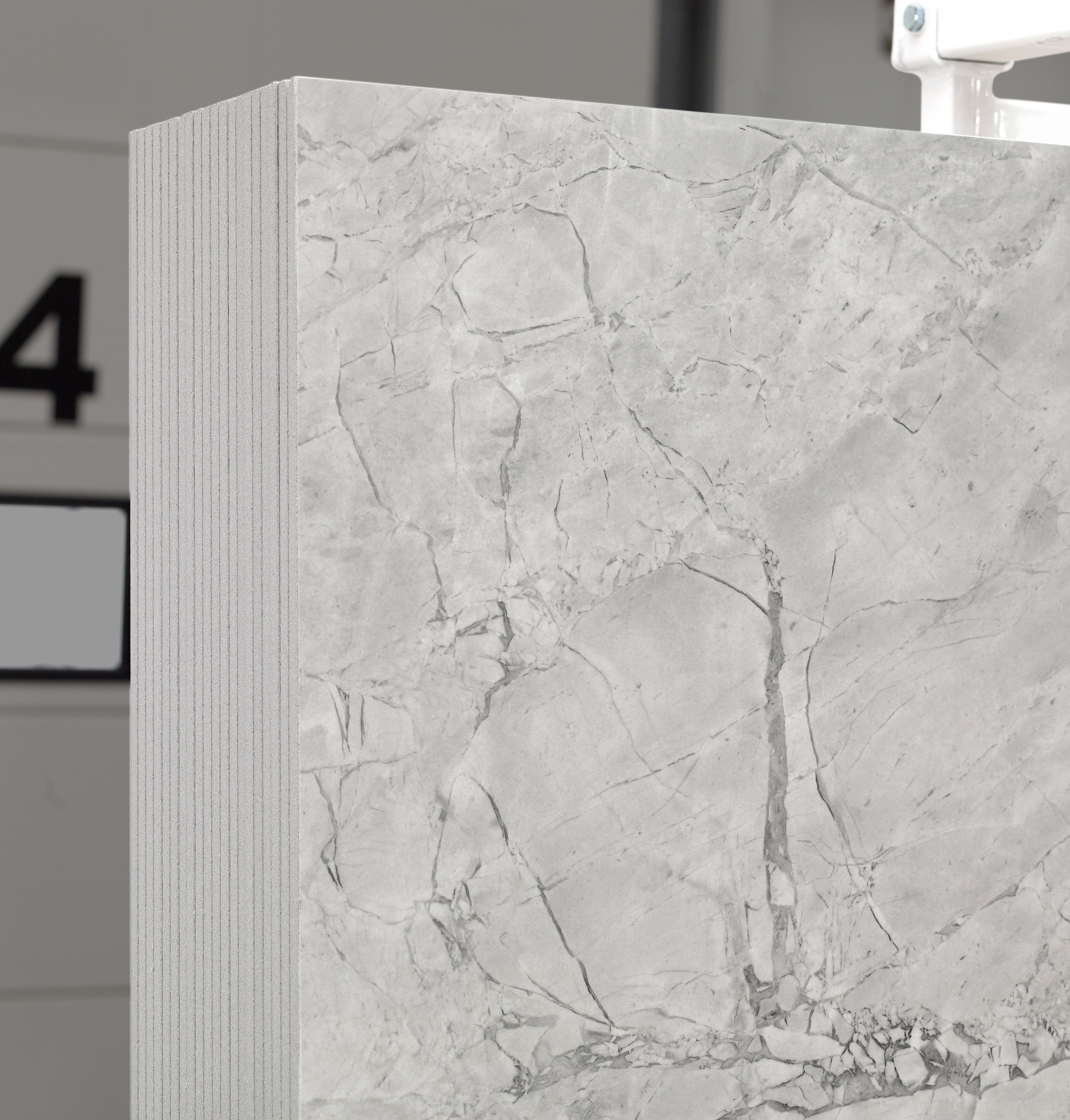Majesto Super White sintered stone slabs by Anatolia, top-down product view, 64"×127"×15/32" size. Turkish sintered stone for floors and walls.