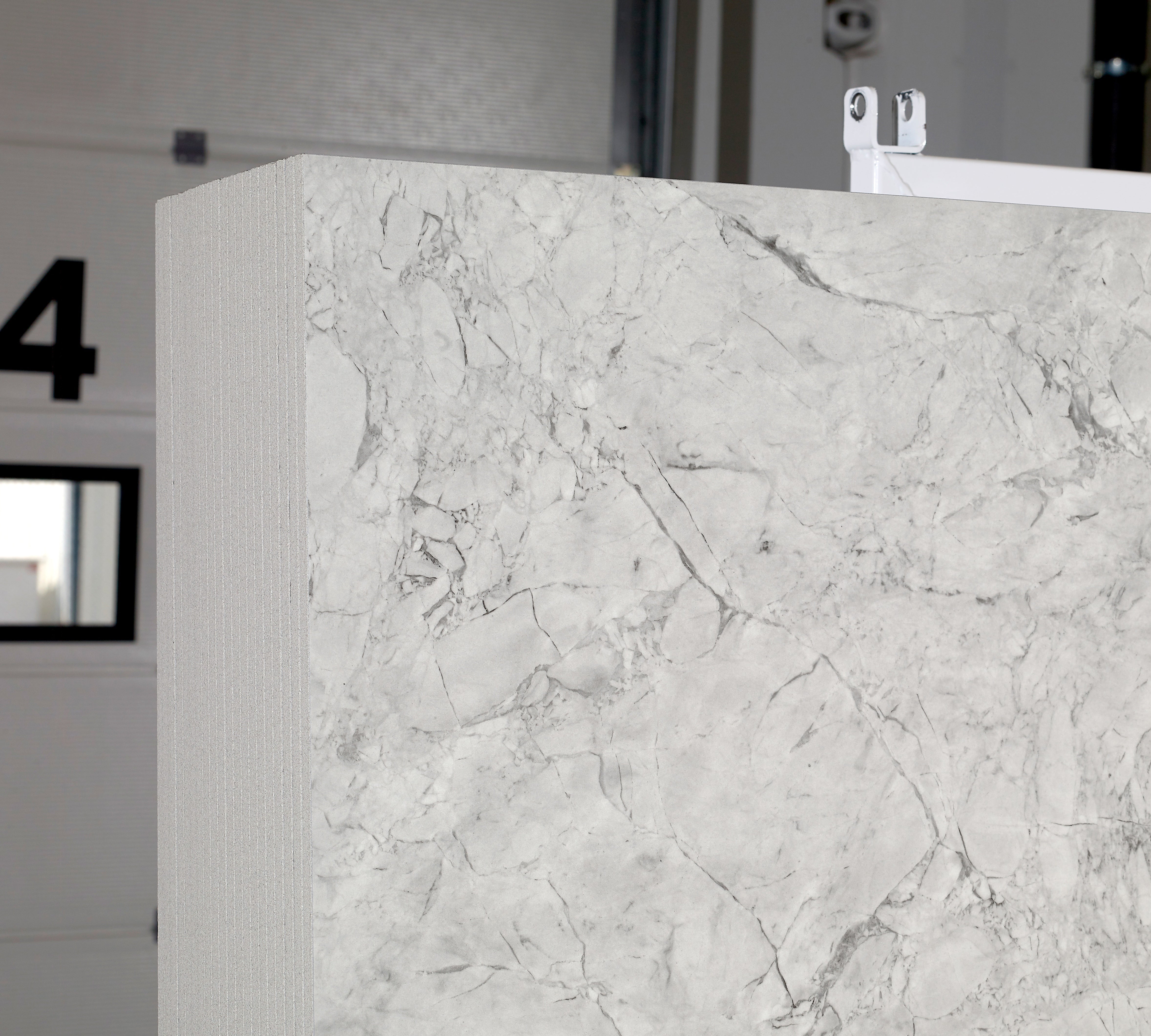 Majesto Super White sintered stone slabs by Anatolia, top-down product view, 64"×127"×15/32" size. Turkish sintered stone for floors and walls.