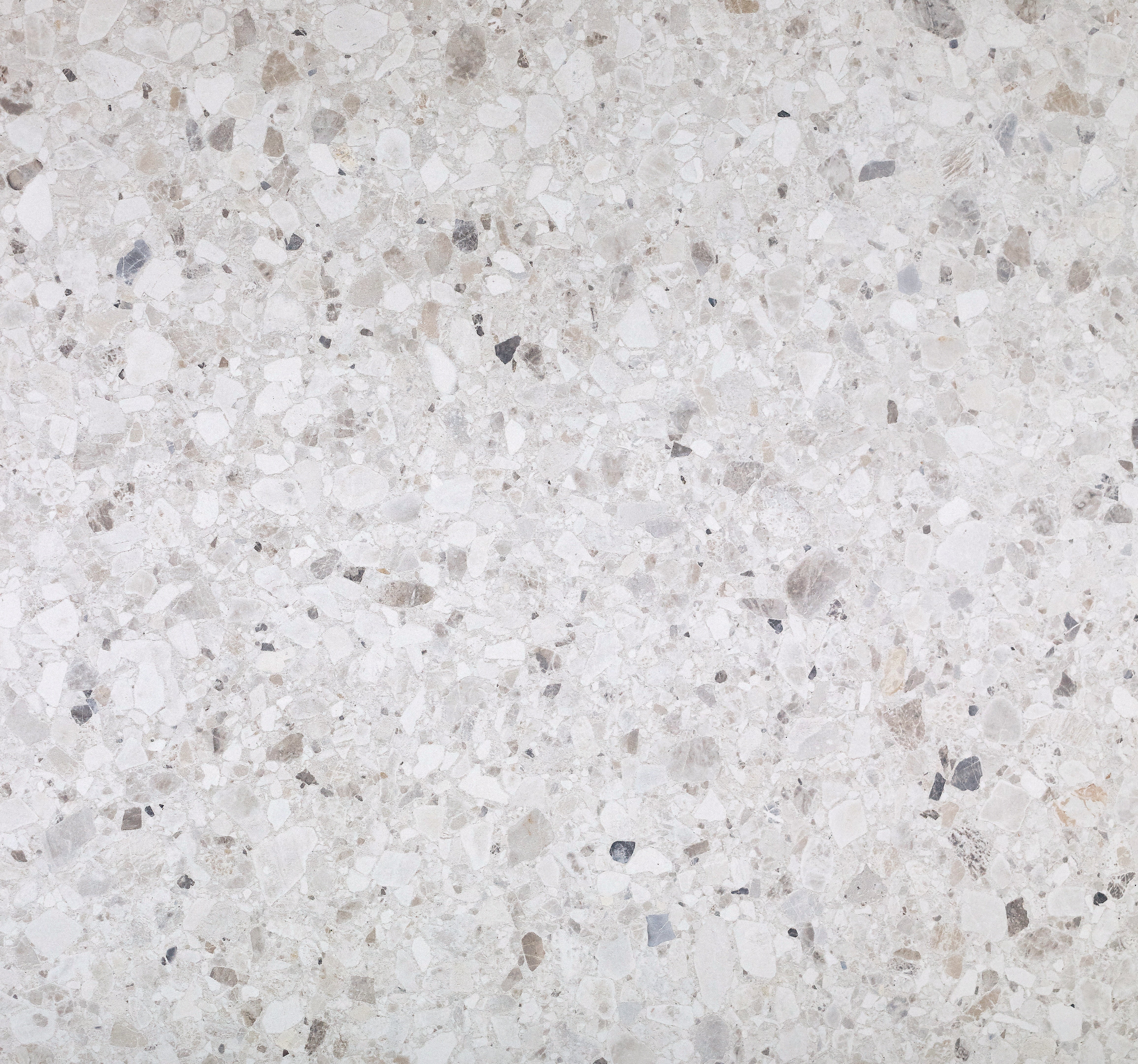 Majesto Terrazzo Delicato sintered stone slabs by Anatolia, top-down product view, 64"×127"×15/32" size. Turkish sintered stone for floors and walls.
