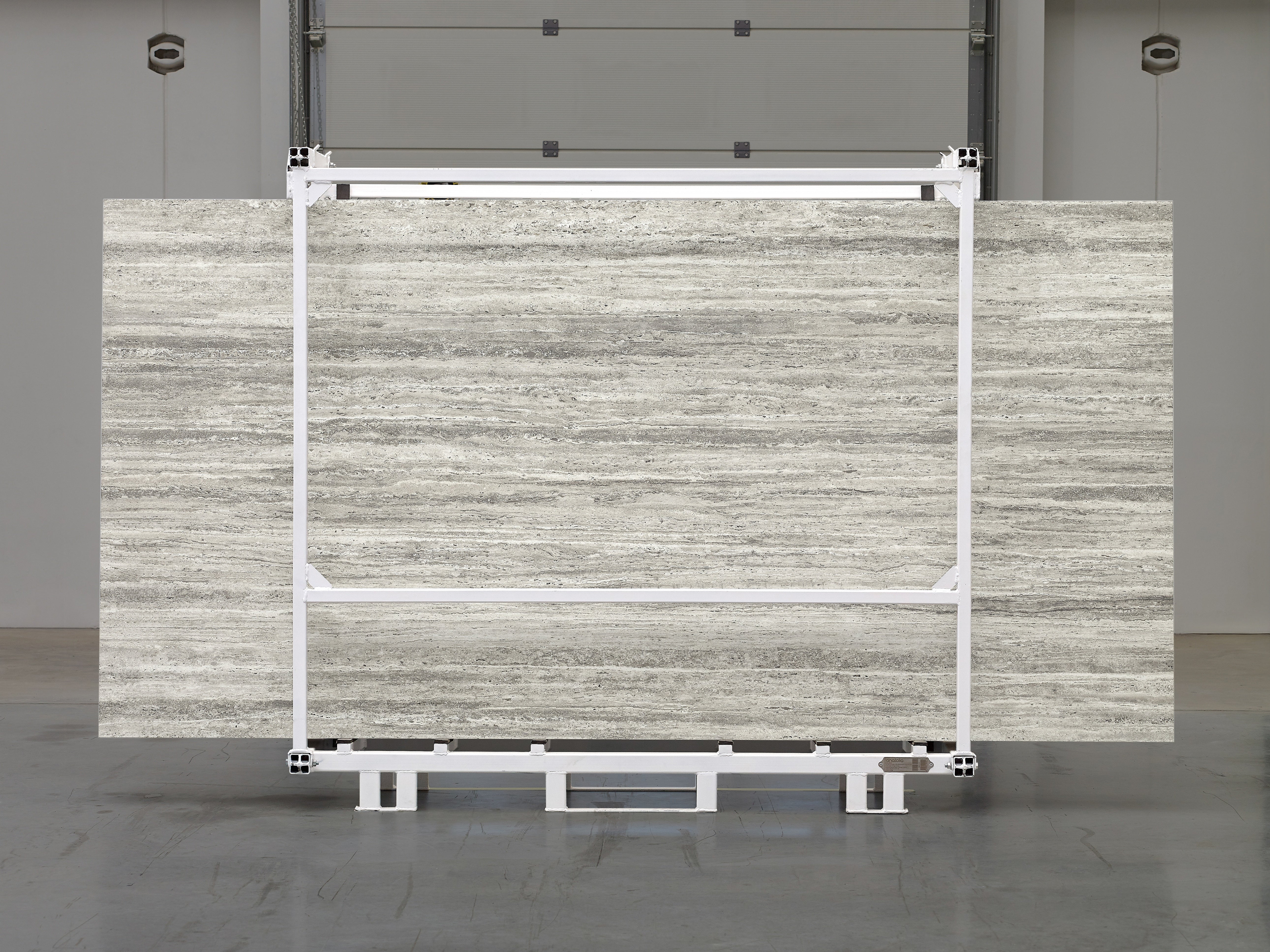 Majesto Travertino Titanium sintered stone slabs by Anatolia, top-down product view, 64"×127"×15/32" size. Turkish sintered stone for floors and walls.