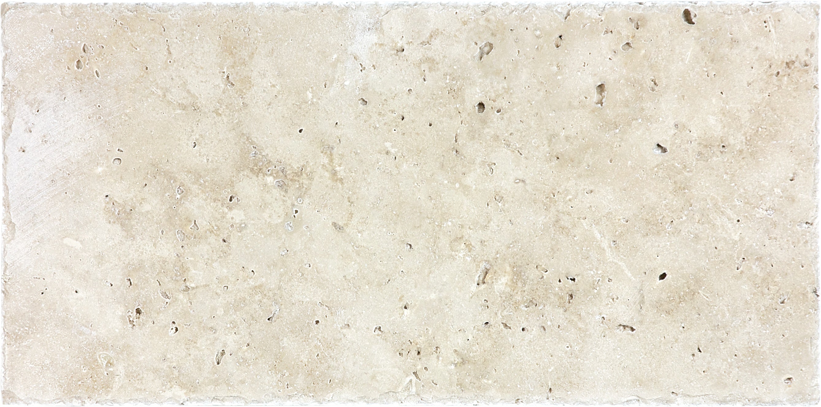 Ivory travertine field tile by Anatolia, top-down product view, 8"×16"×15/32" size. Turkish travertine for floors and walls.