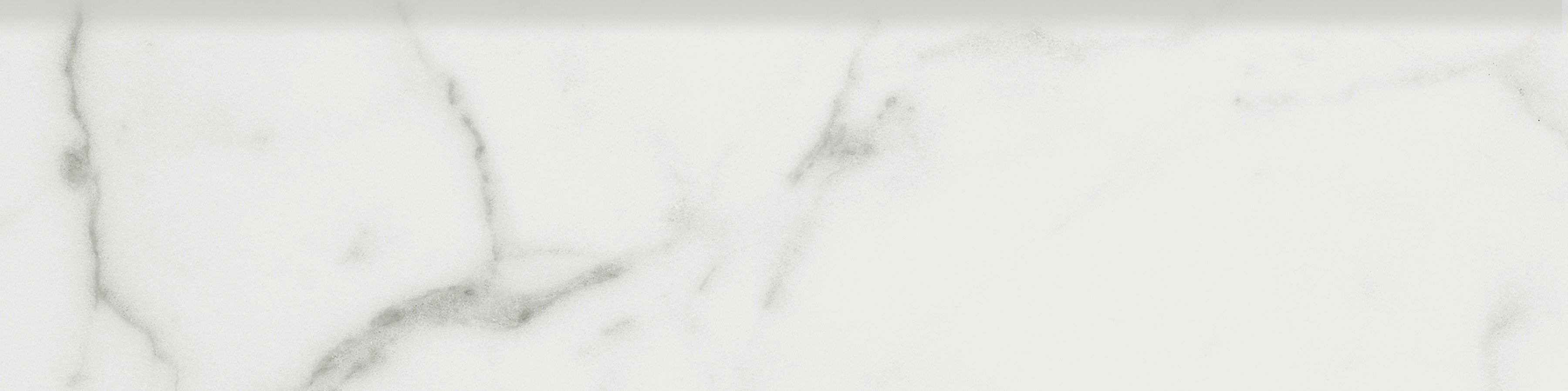 Mayfair Statuario Venato porcelain trim by Anatolia, top-down product view, 3"×12"×11/32" size. Indian porcelain for floors and walls.