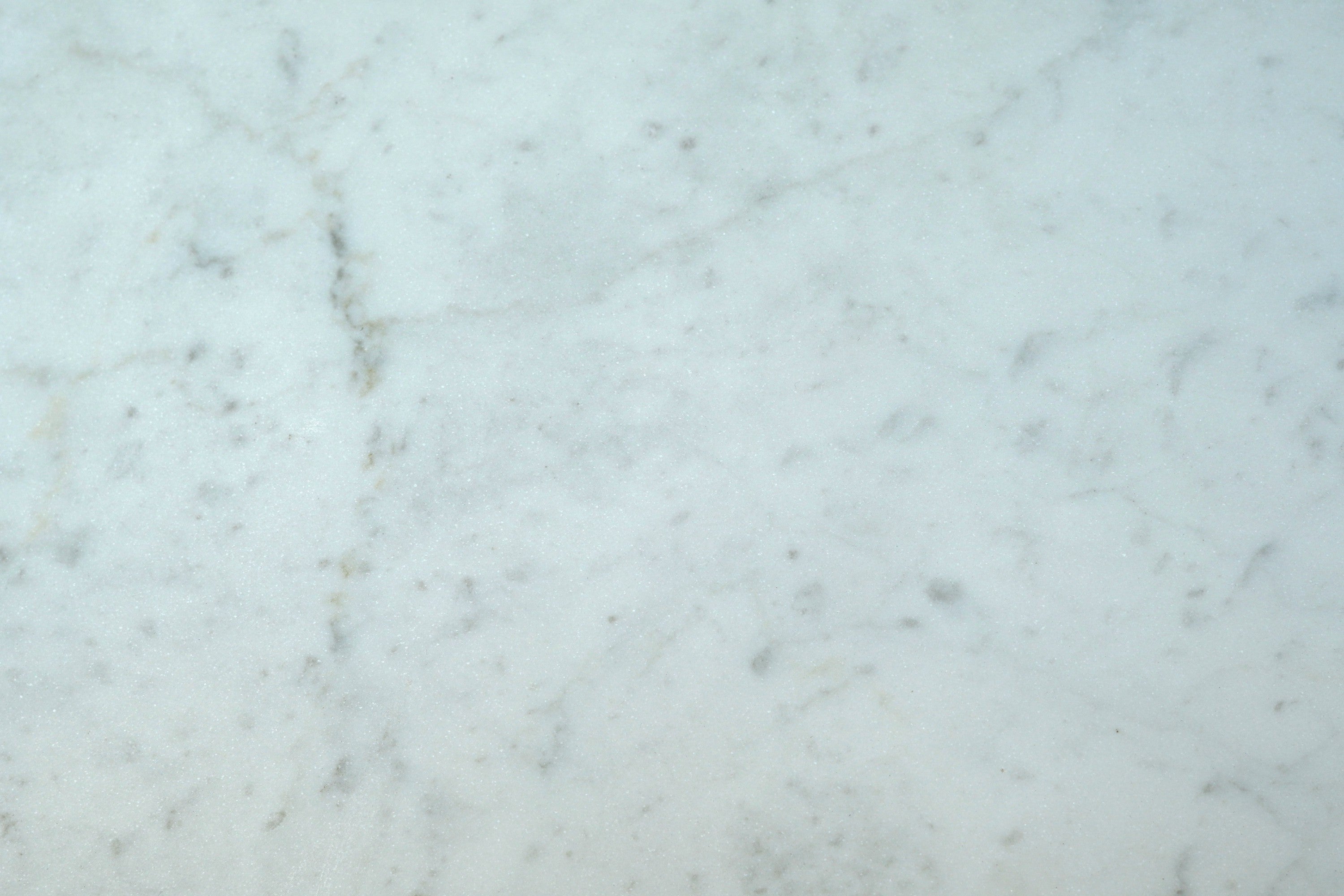 Bianco Carrara marble trim, top-down product view, 1"×3/4"×3/4" size. Premium marble for floors and walls.