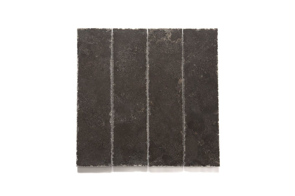 Tahitian Black limestone field tile, product image, 12"×24"×1/2" size. Premium limestone for floors and walls.