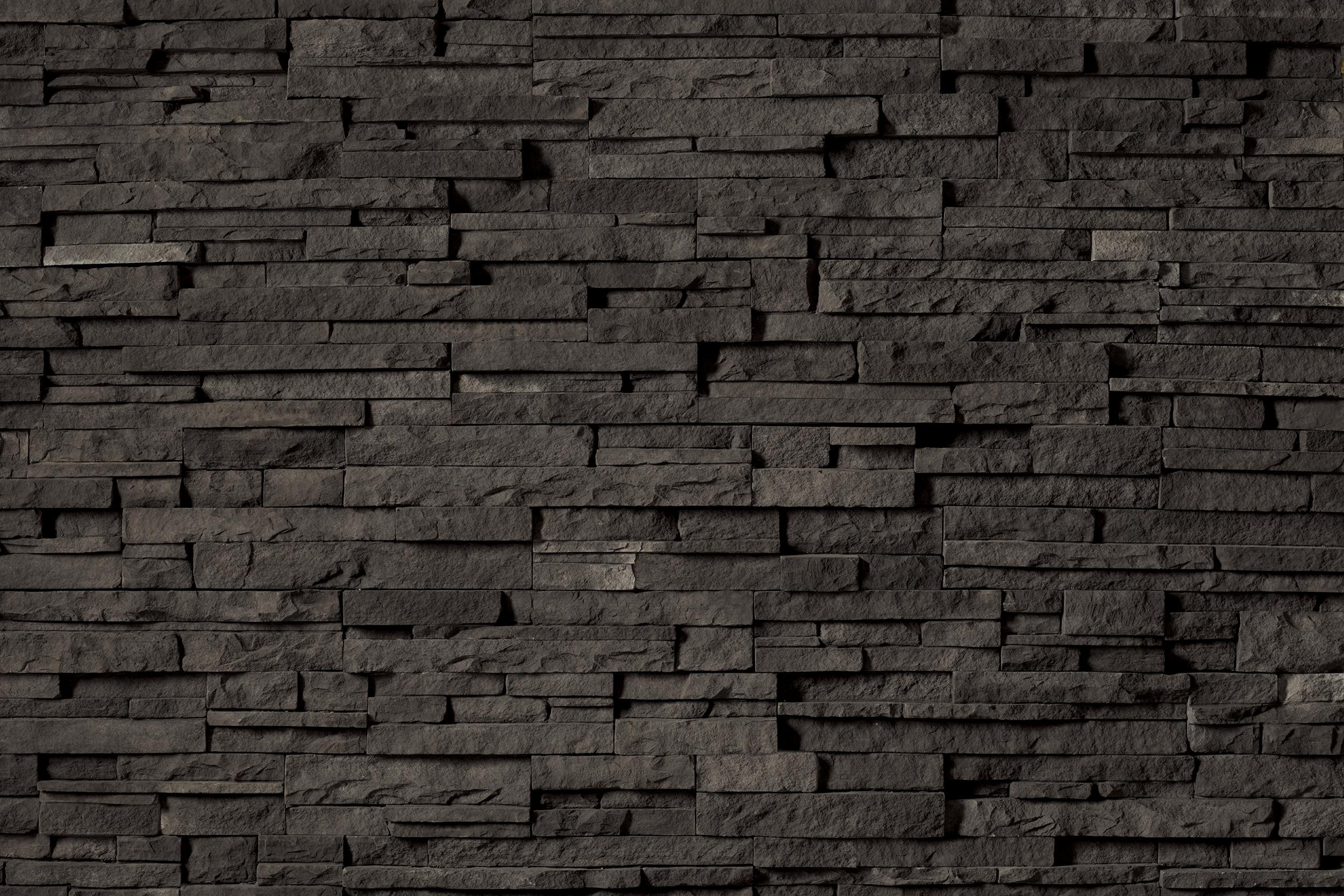Pro-Fit Alpine Ledgestone Dark Ridge wall panels by Cultured Stone, primary product image. Premium stone veneer for exterior and interior walls.