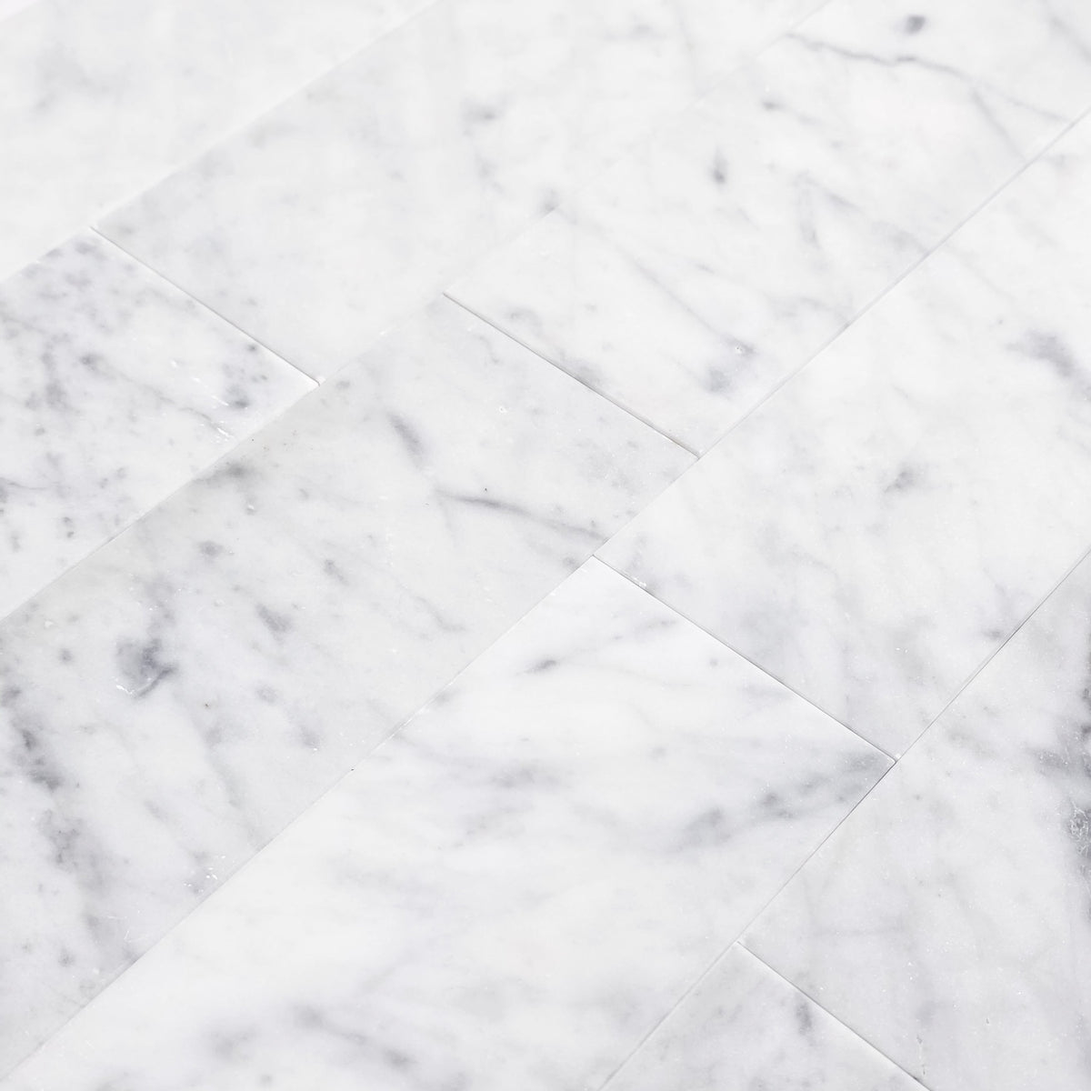 Elon Tile Bianco Carrara Field Tile tile arrangement — available at Surface Group