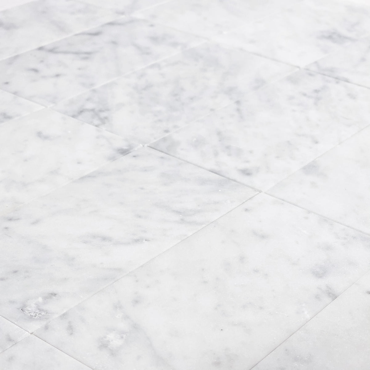 Elon Tile Bianco Carrara Field Tile tile arrangement — available at Surface Group