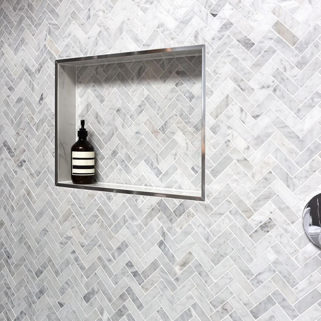 Elon Tile Herringbone tile in a room setting — available at Surface Group