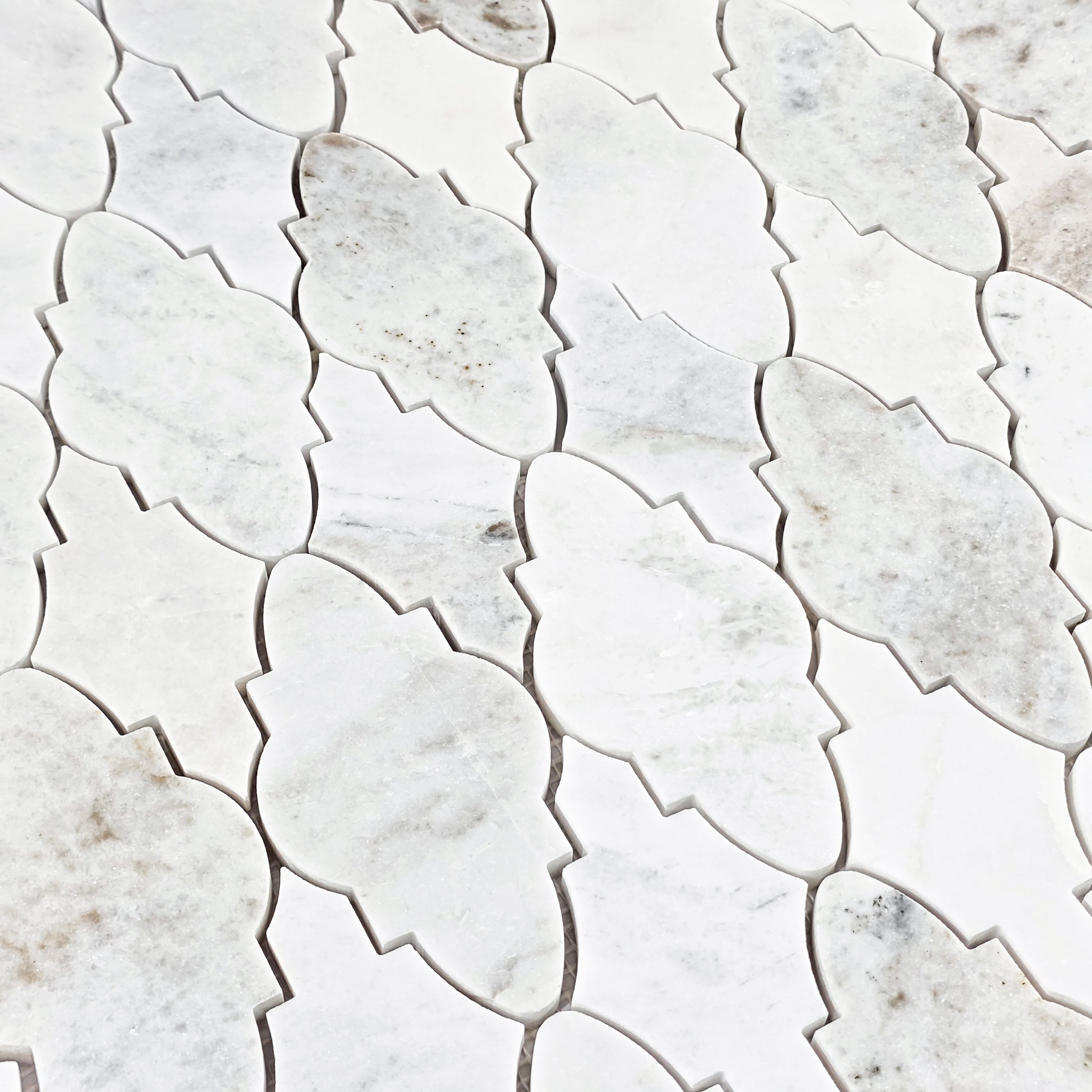 Elon Tile Bianco Oro Mosaic tile arrangement — available at Surface Group