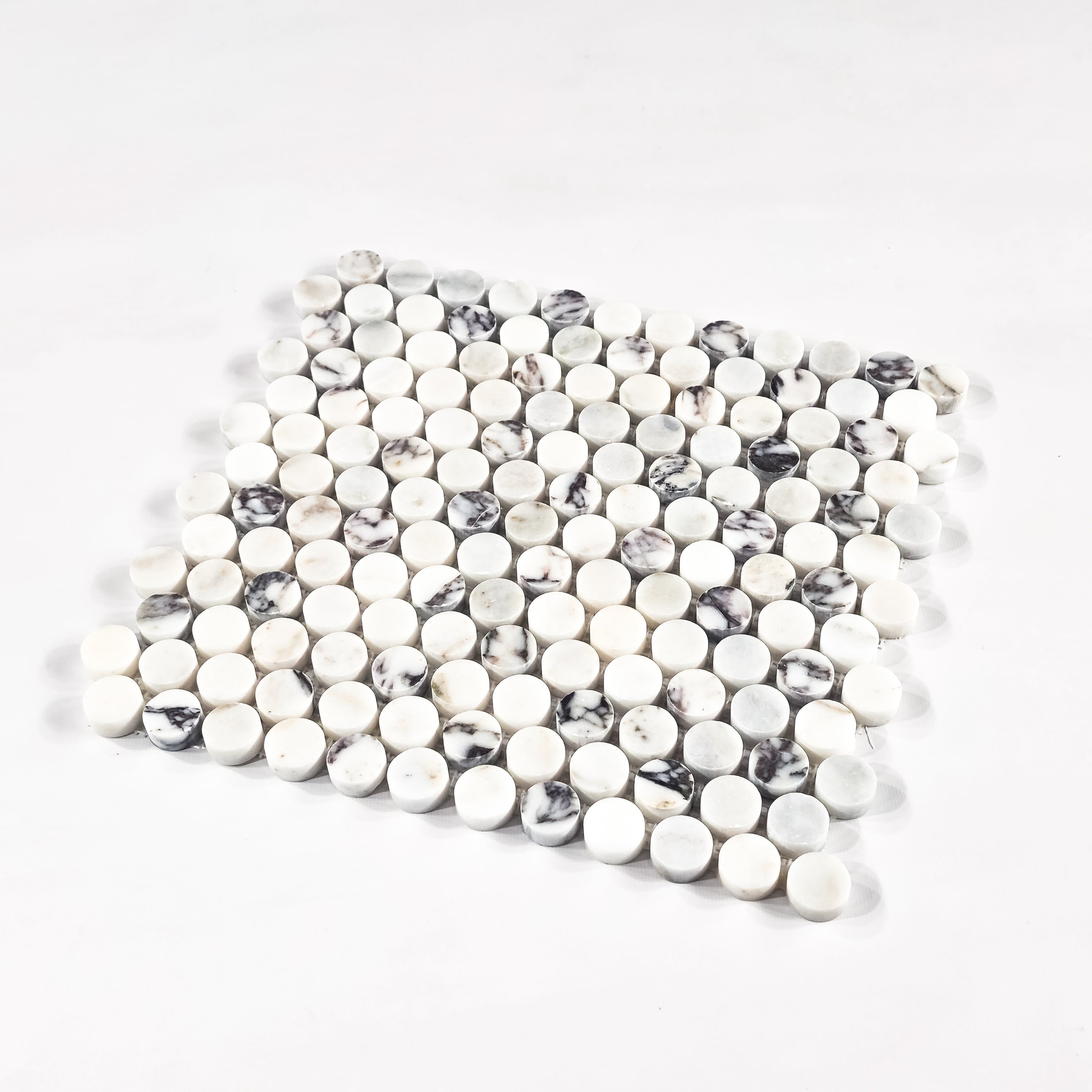 Elon Tile Rounds tile close-up view — available at Surface Group