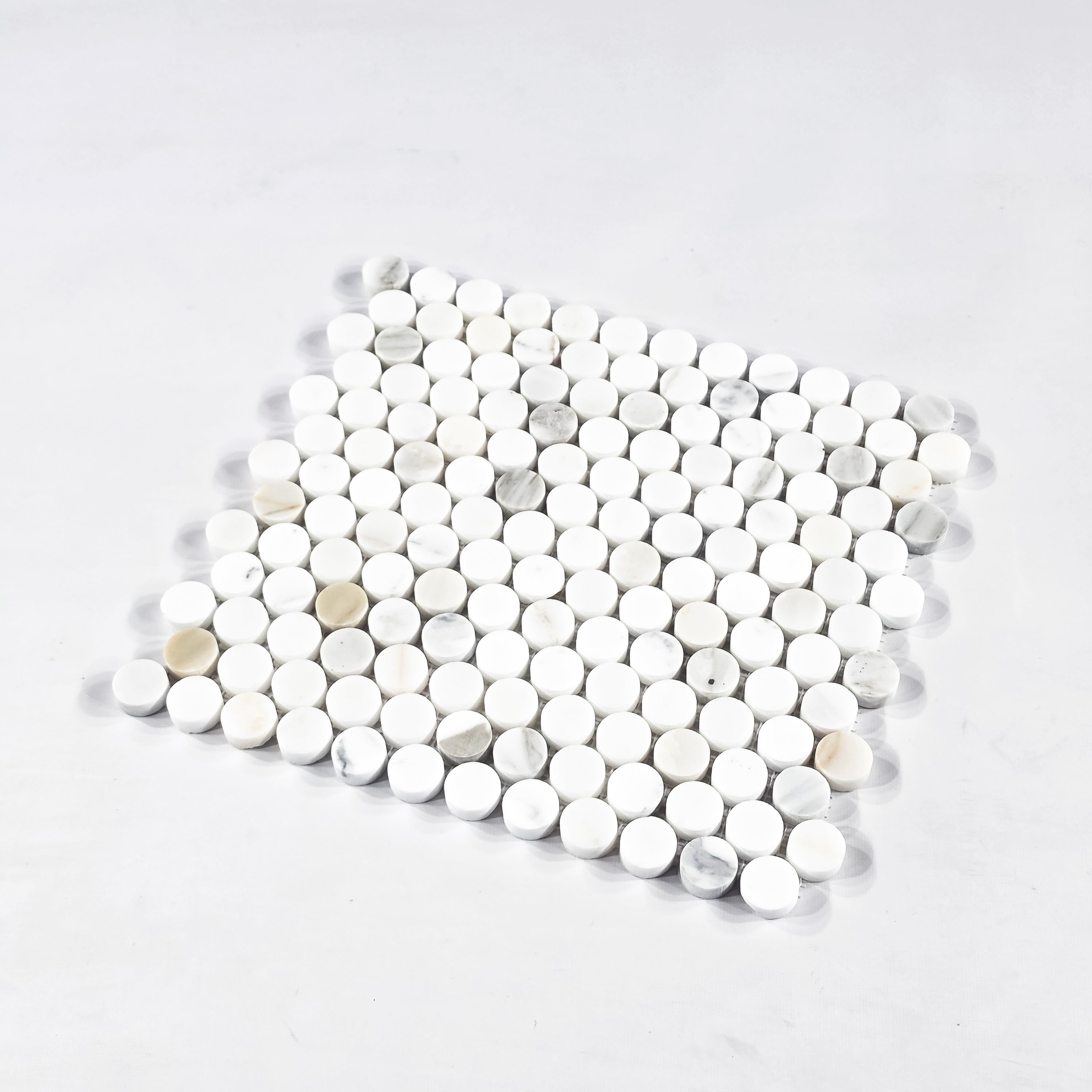 Elon Tile Rounds tile close-up view β available at Surface Group