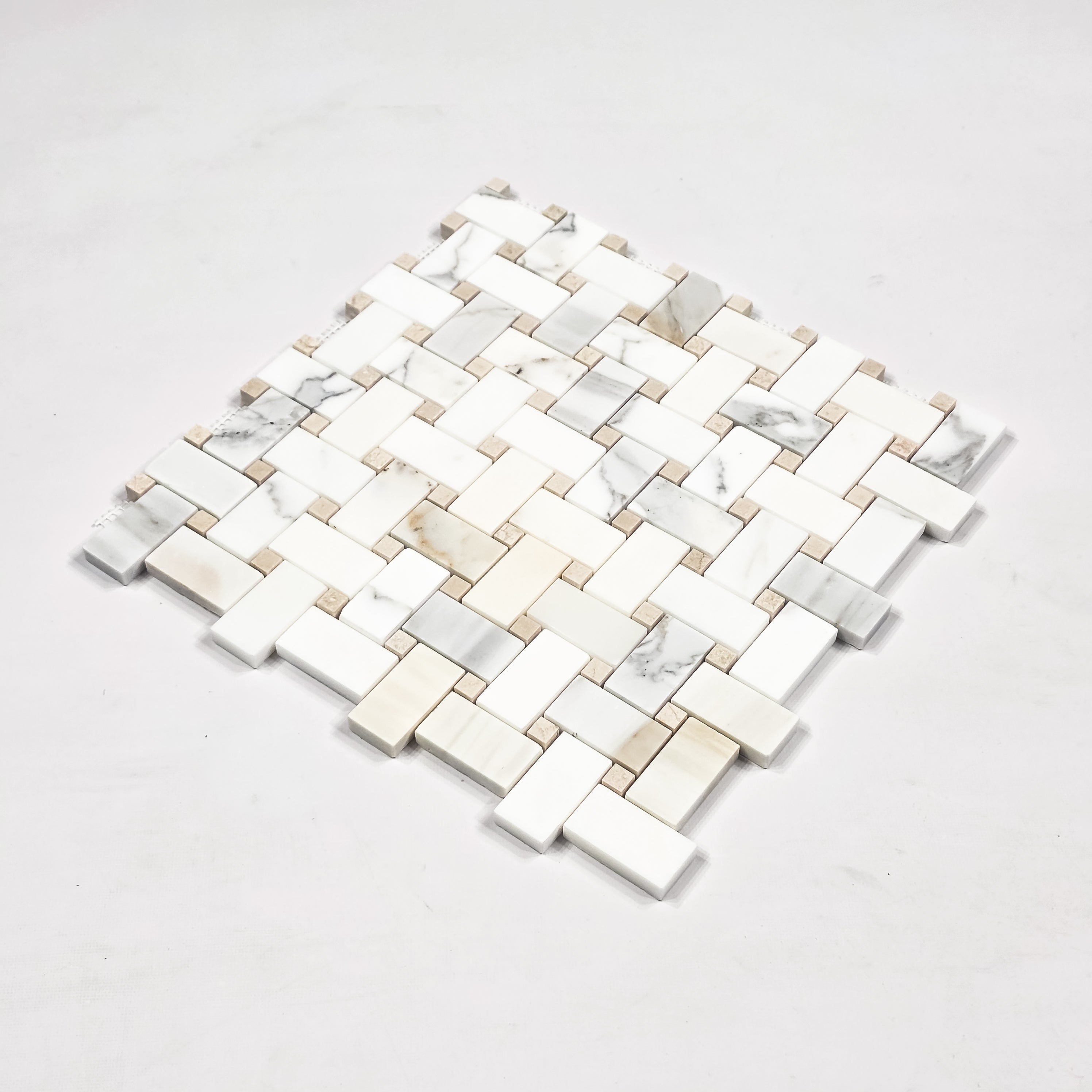 Elon Tile Herringbone tile close-up view β available at Surface Group