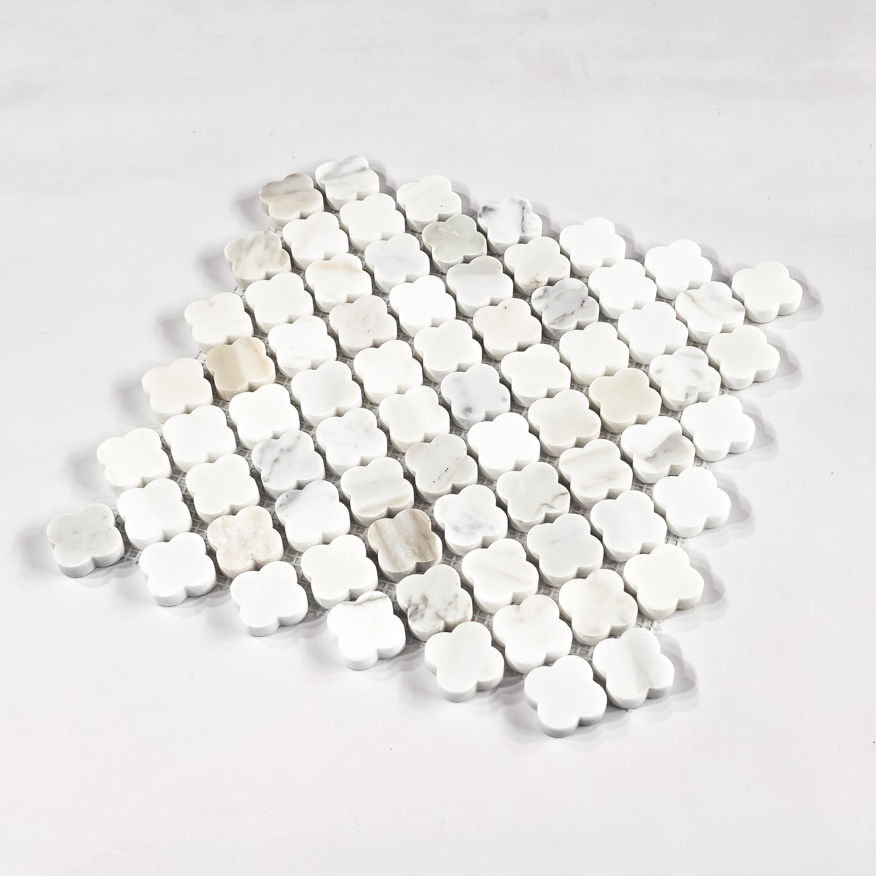 Elon Tile Clover tile close-up view β available at Surface Group