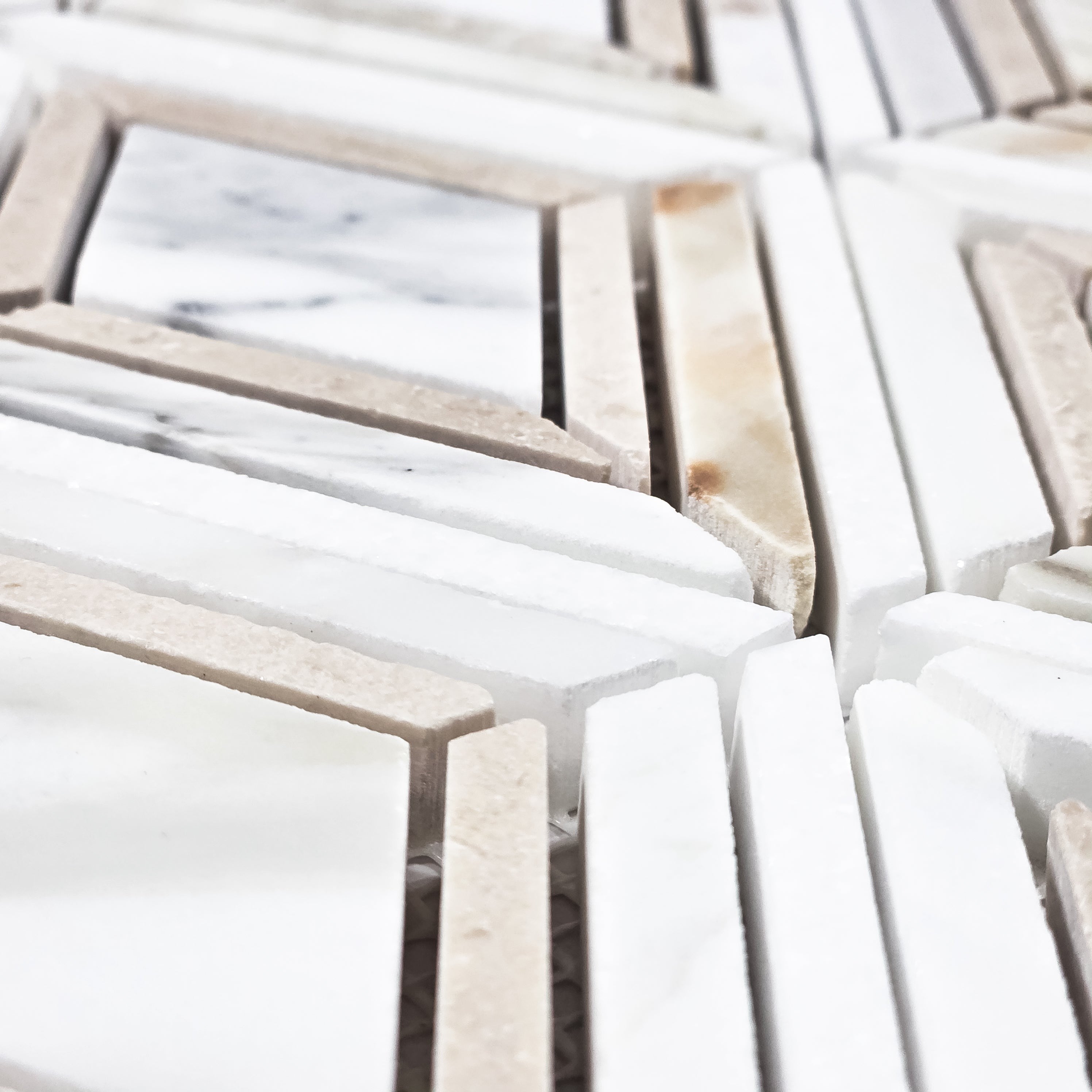 Elon Tile Calacatta Gold Mosaic tile arrangement — available at Surface Group