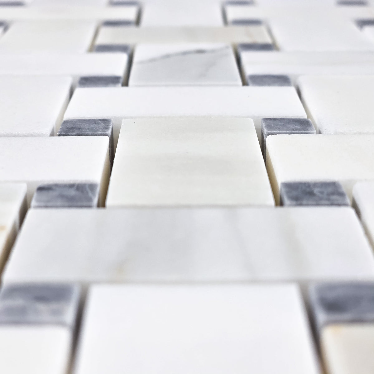 Elon Tile Herringbone tile arrangement — available at Surface Group