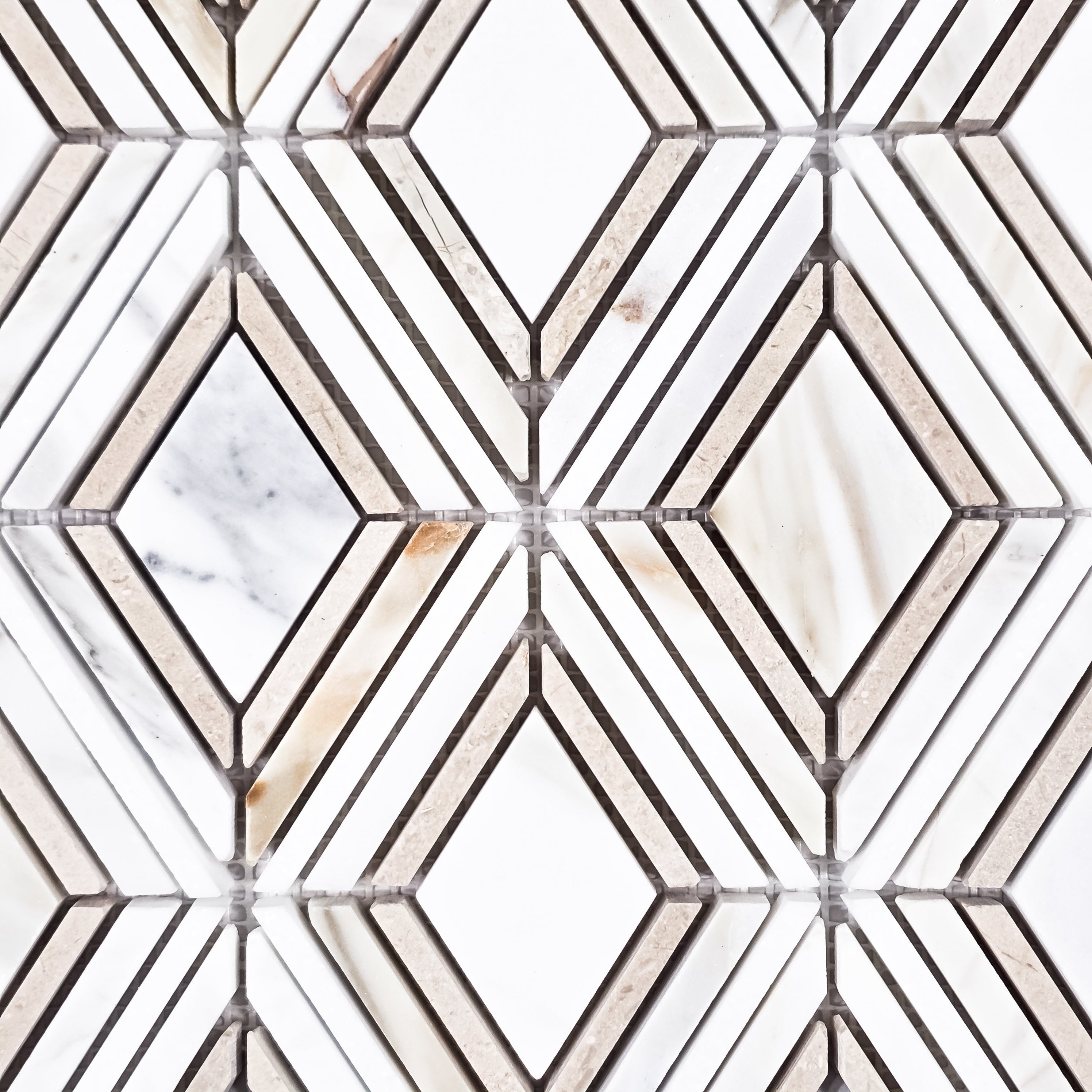 Elon Tile Calacatta Gold Mosaic tile β available at Surface Group