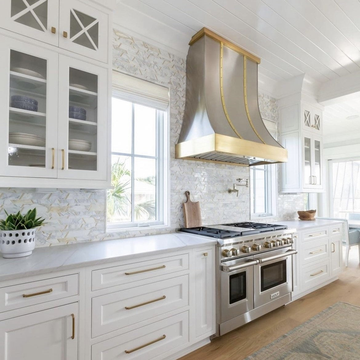 Elon Tile Calacatta Gold Mosaic tile in a room setting β available at Surface Group