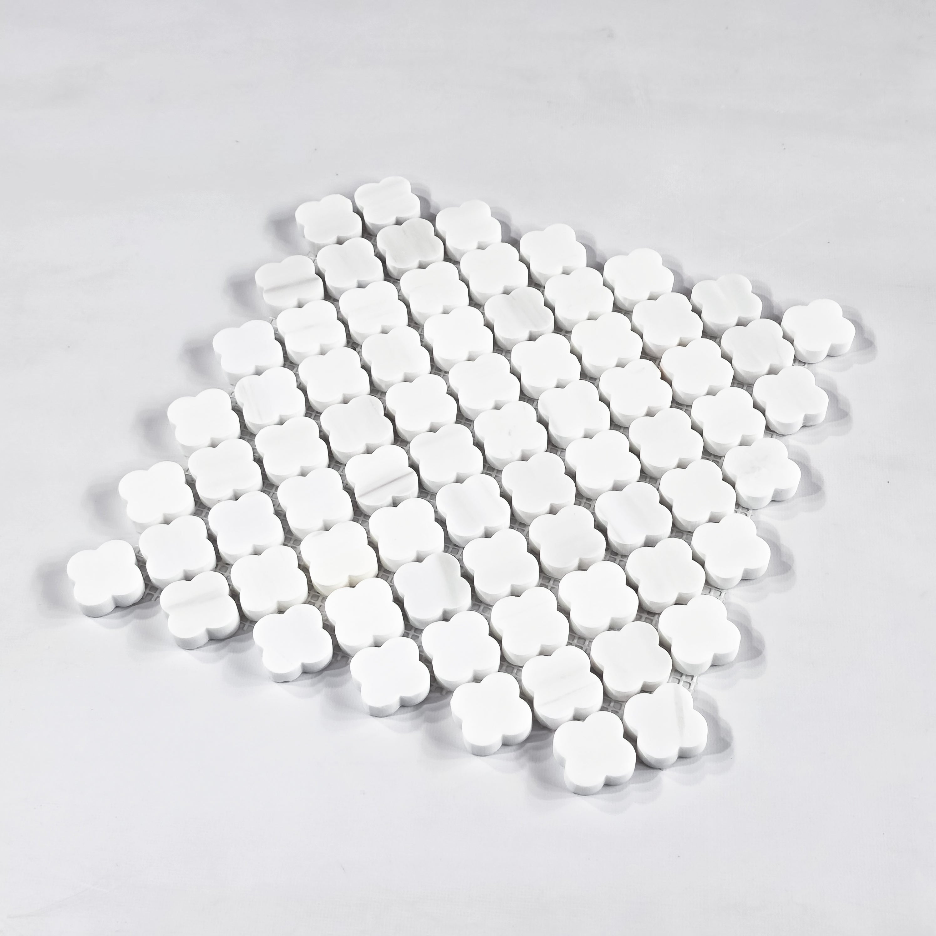 Elon Tile Clover tile close-up view — available at Surface Group