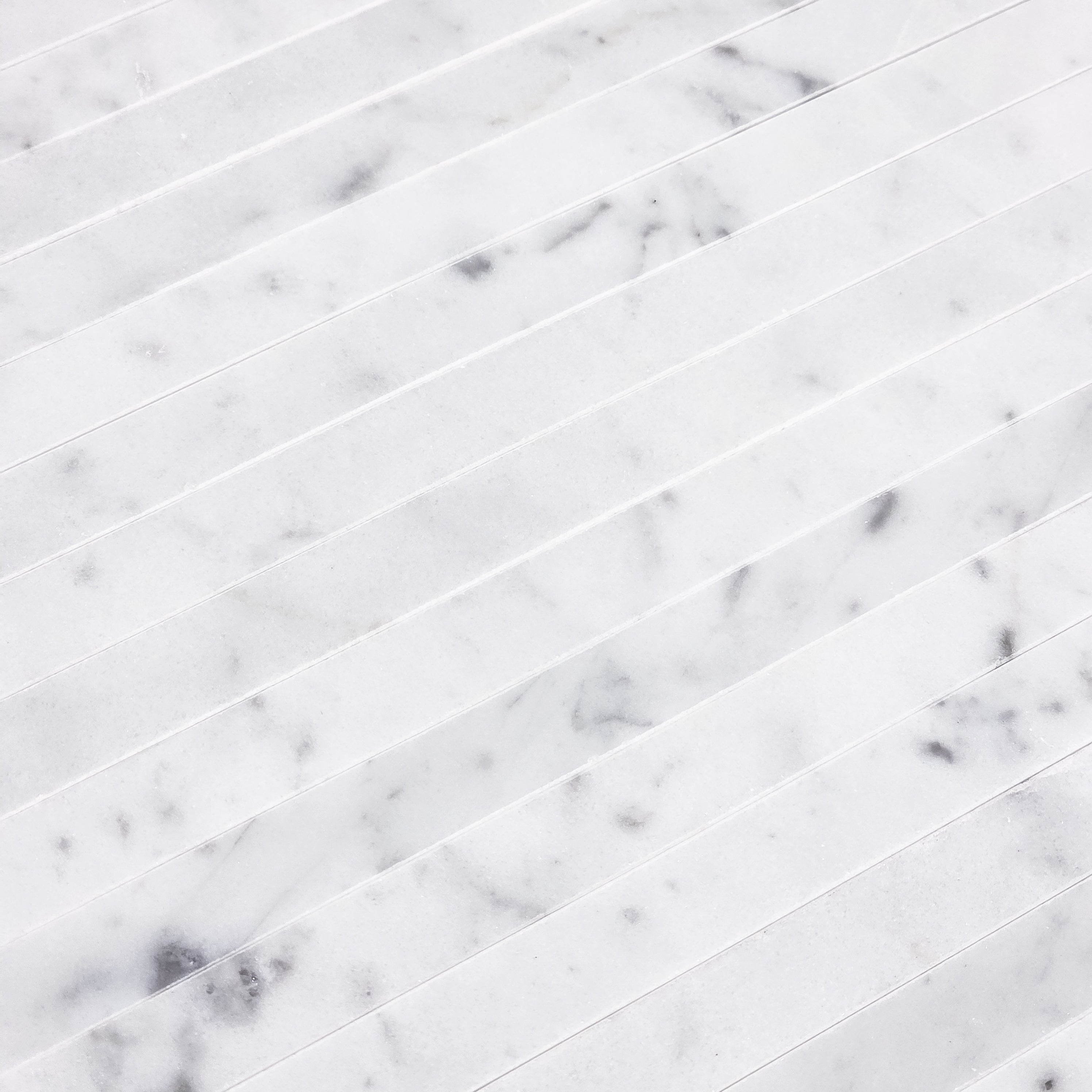 Elon Tile Flat Liner tile arrangement — available at Surface Group