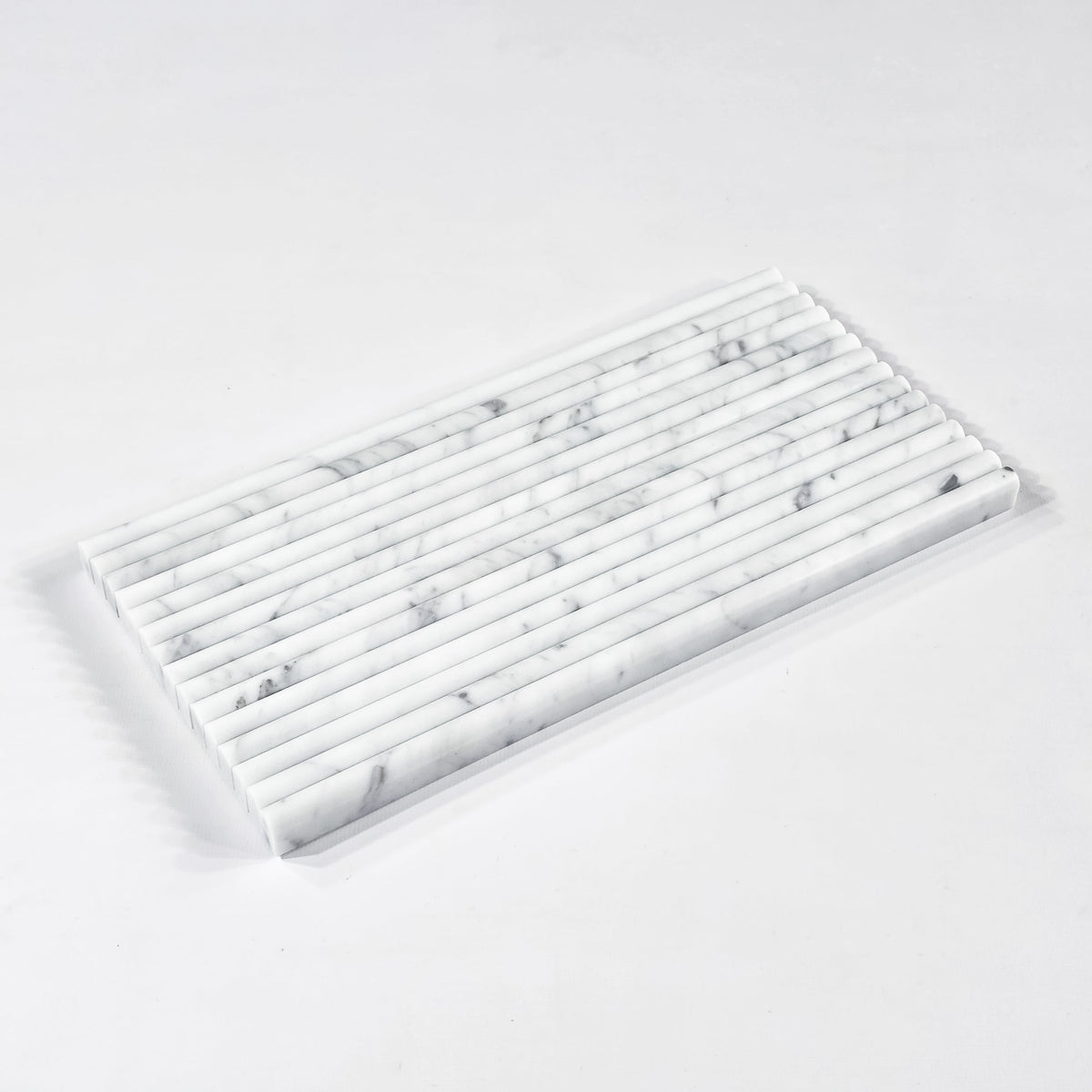 Elon Tile Micro Pencil tile arrangement — available at Surface Group