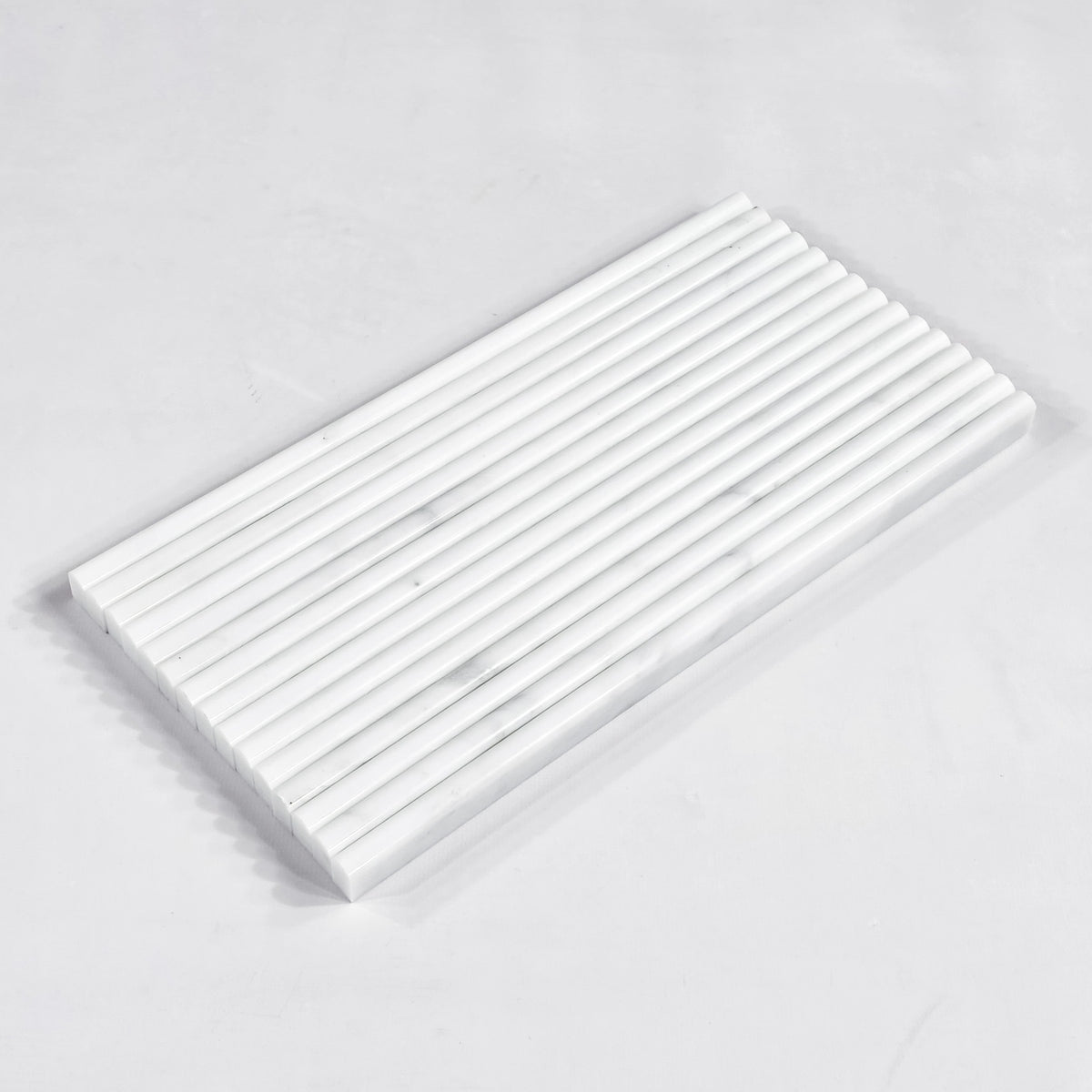 Elon Tile Micro Pencil tile arrangement — available at Surface Group