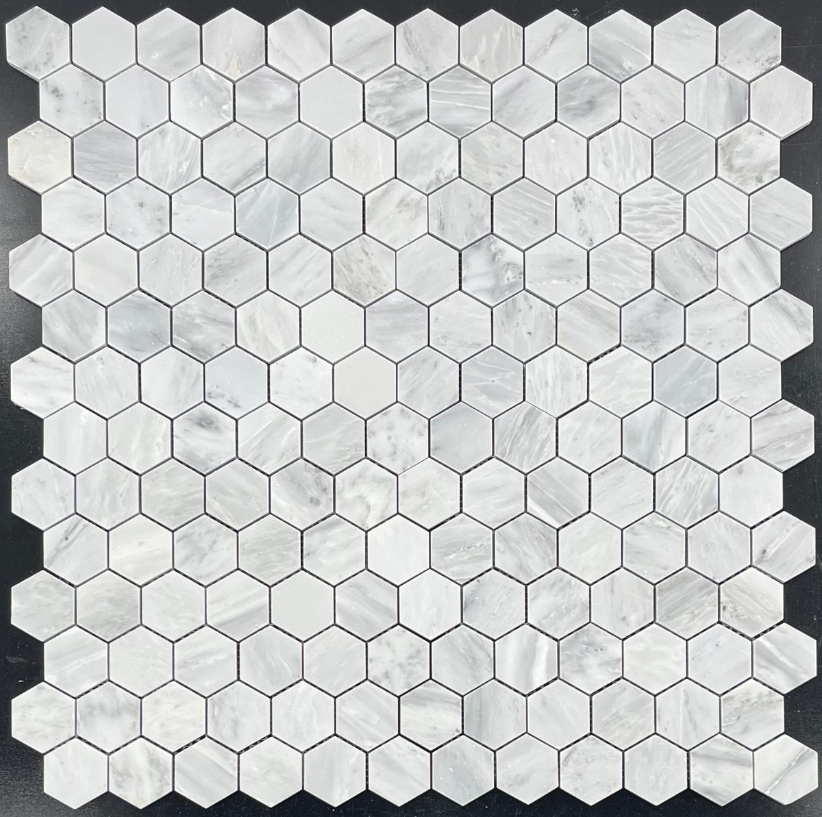 Elon Tile Hexagon tile — available at Surface Group