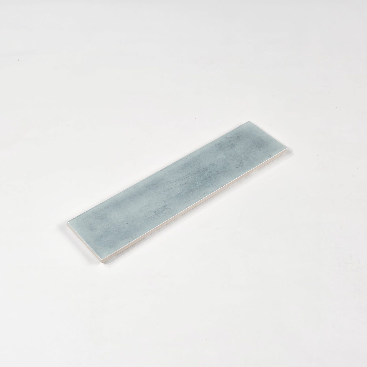 Elon Tile Opal Turquoise tile close-up view — available at Surface Group