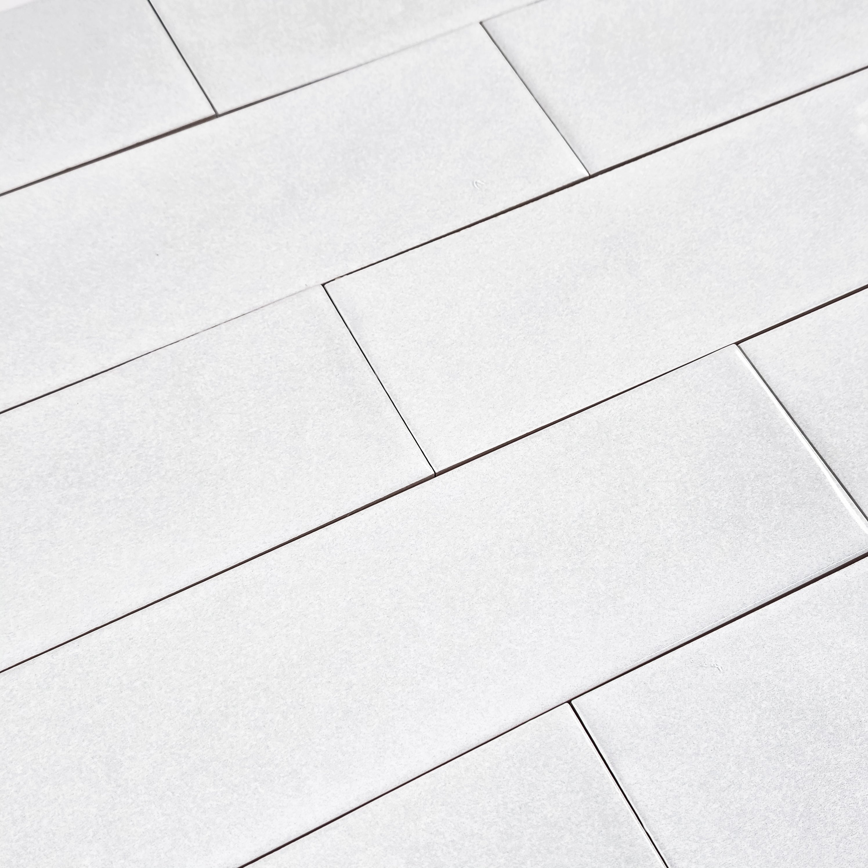 Elon Tile Opal White tile arrangement — available at Surface Group