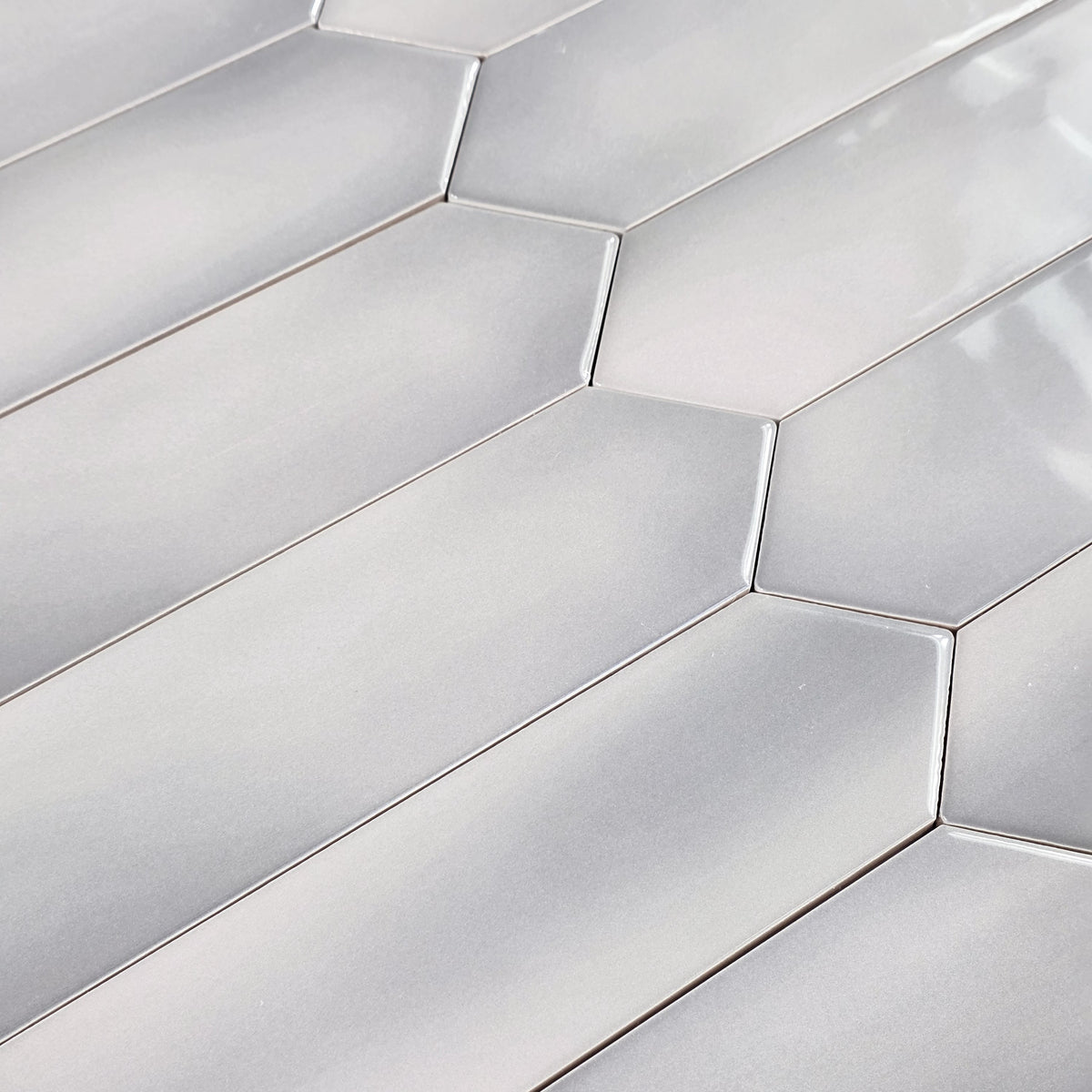 Elon Tile Optics Grey tile arrangement — available at Surface Group