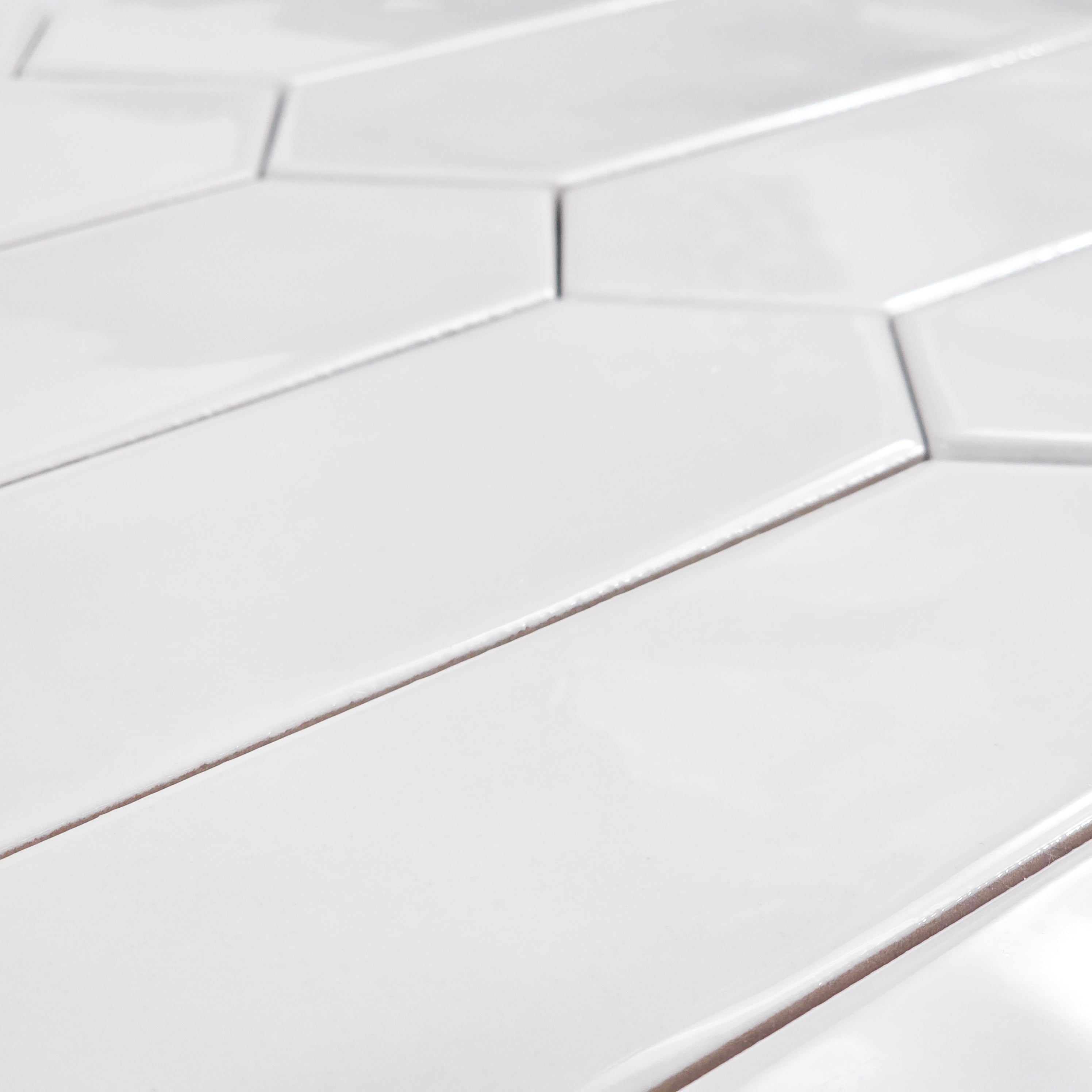 Elon Tile Optics White tile arrangement — available at Surface Group