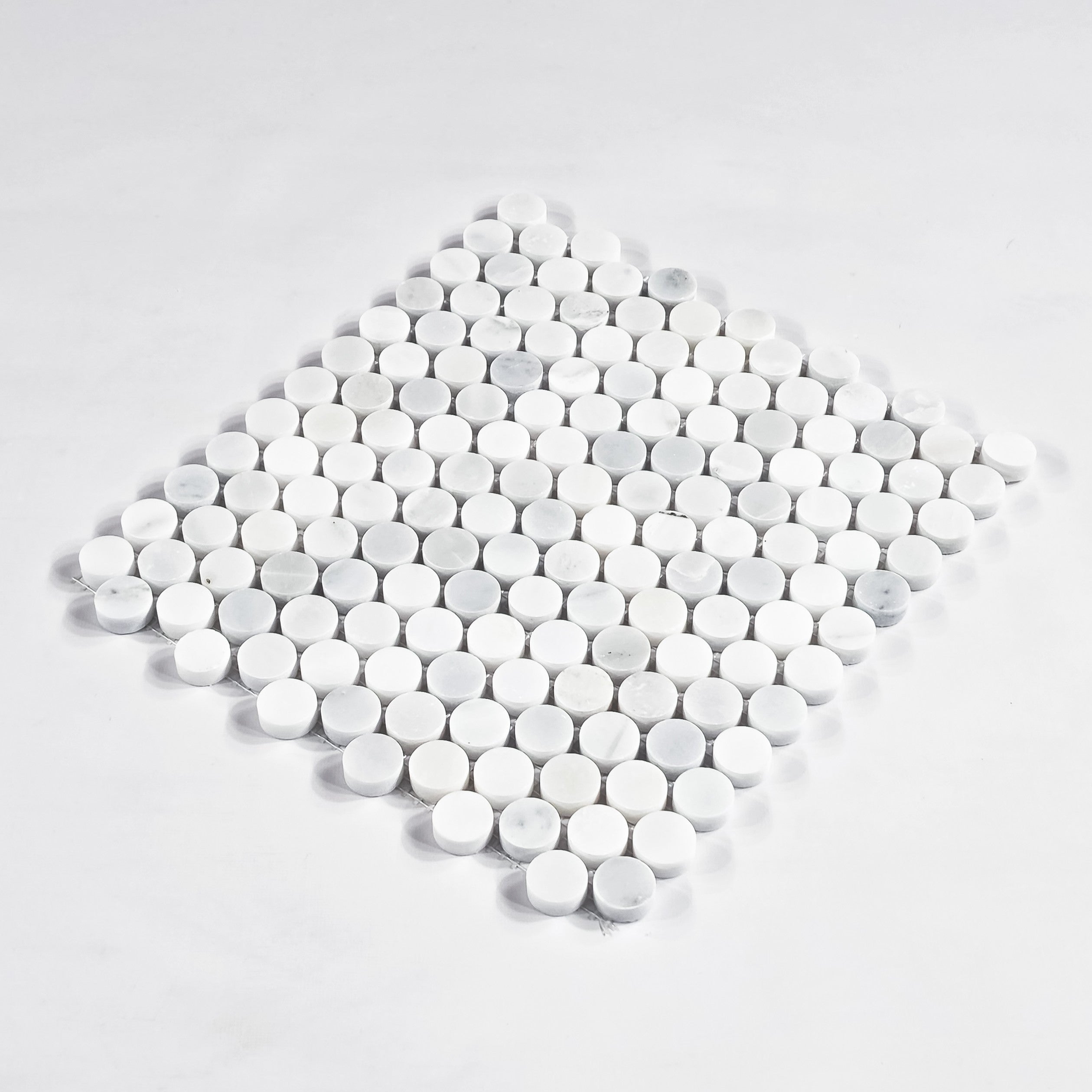 Elon Tile Rounds tile close-up view — available at Surface Group