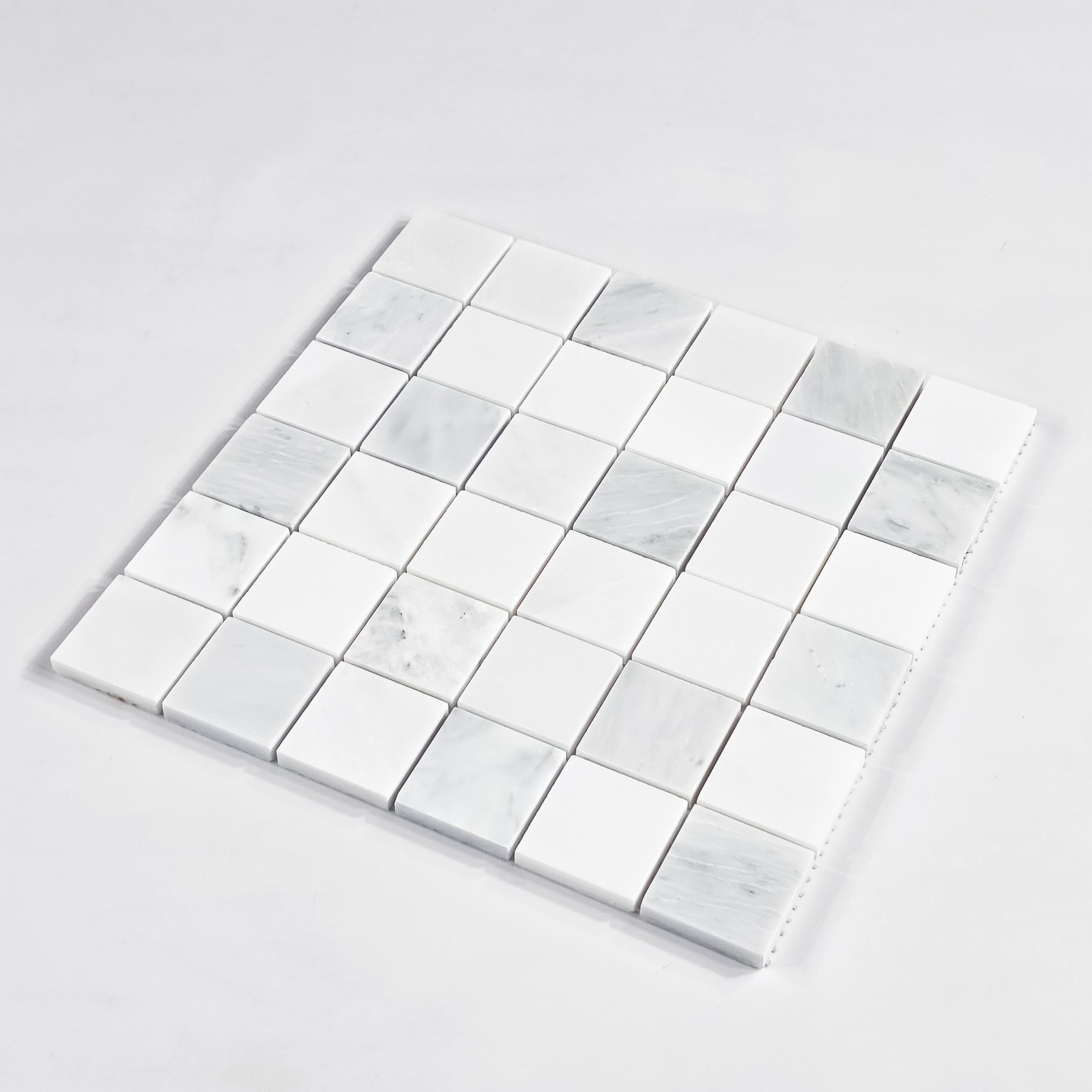 Elon Tile Square tile close-up view β available at Surface Group
