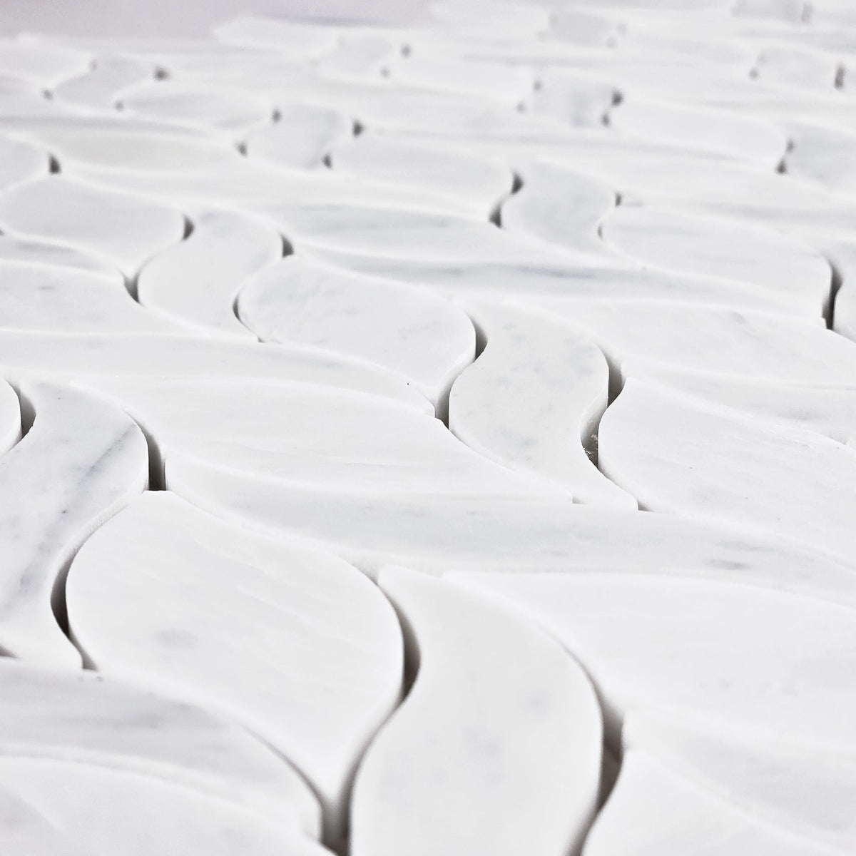 Elon Tile Petal tile arrangement — available at Surface Group