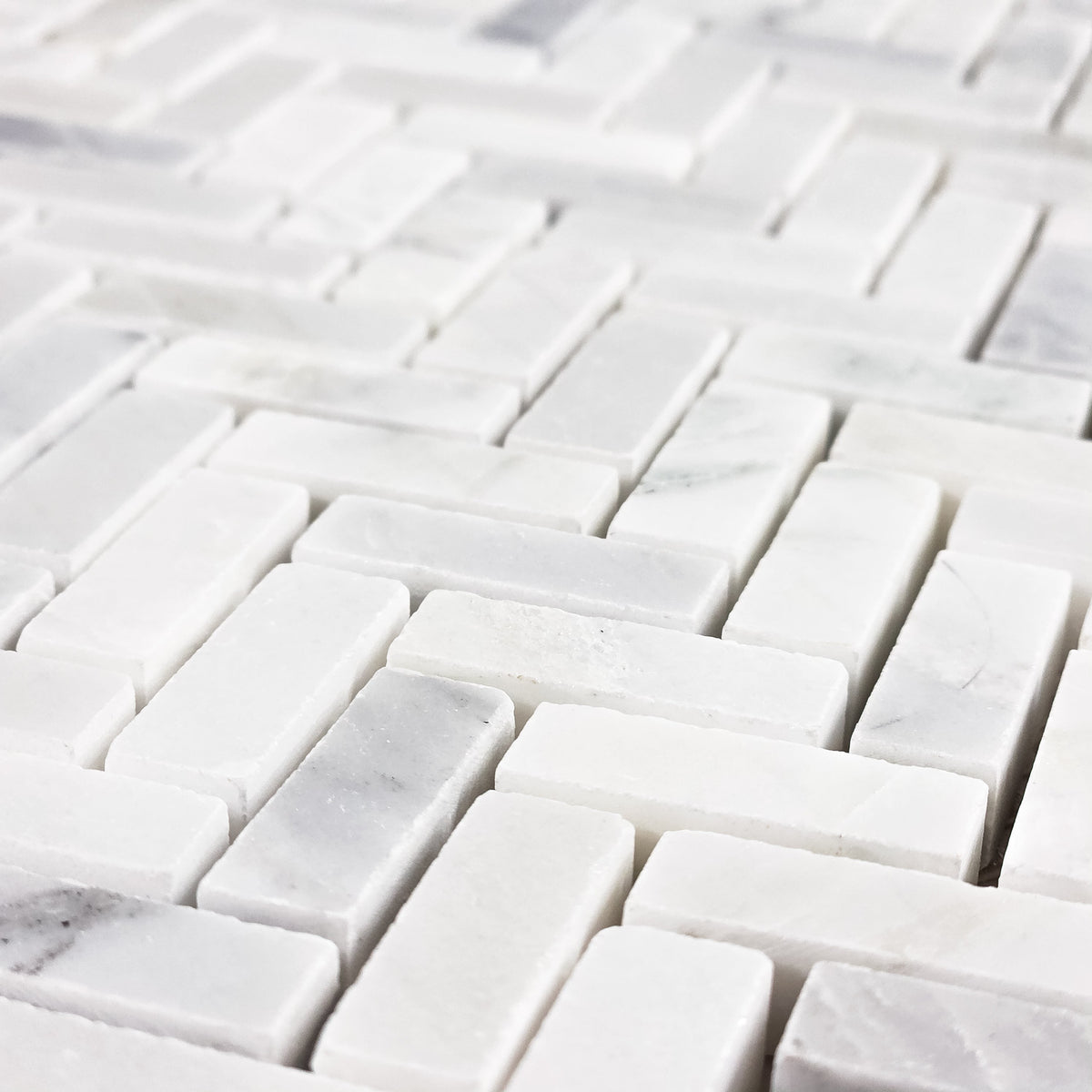 Elon Tile Pearl White Mosaic tile arrangement — available at Surface Group