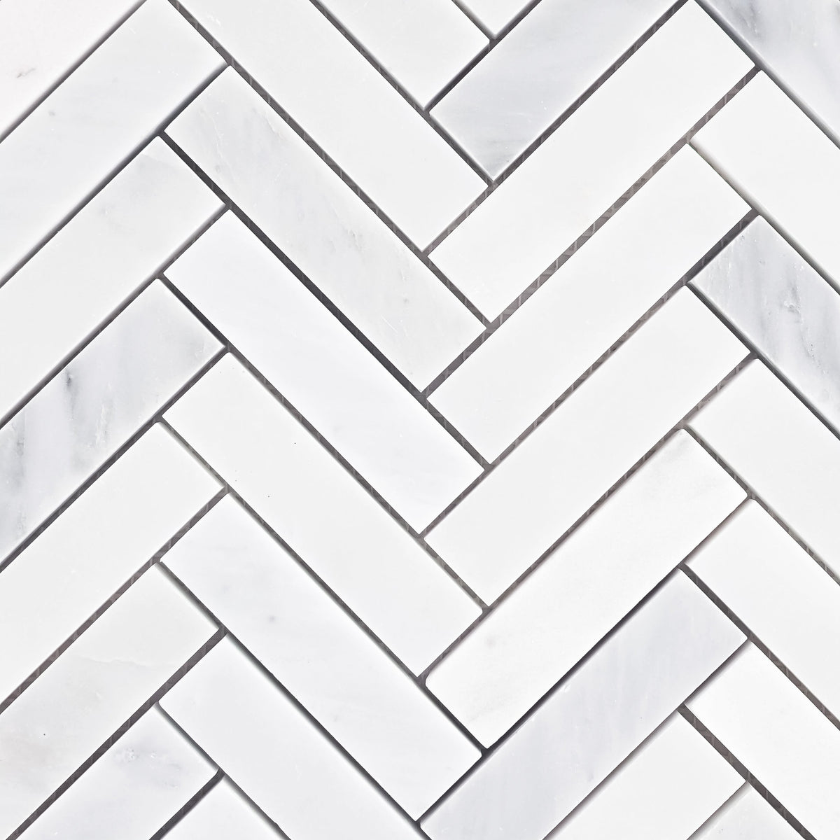 Elon Tile Herringbone tile pattern swatch — available at Surface Group
