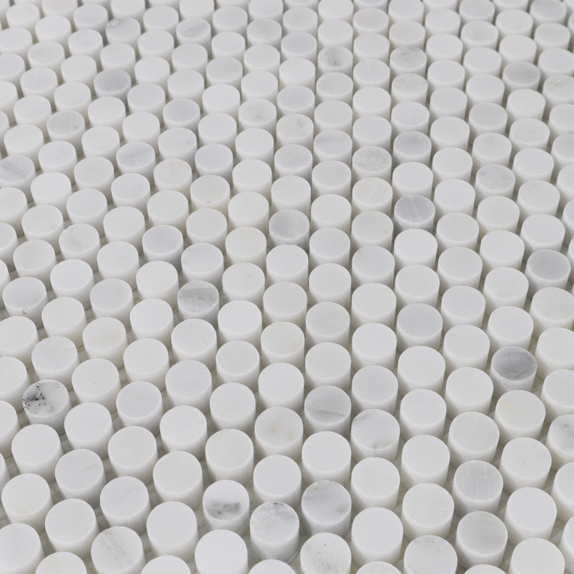 Elon Tile Rounds tile arrangement — available at Surface Group
