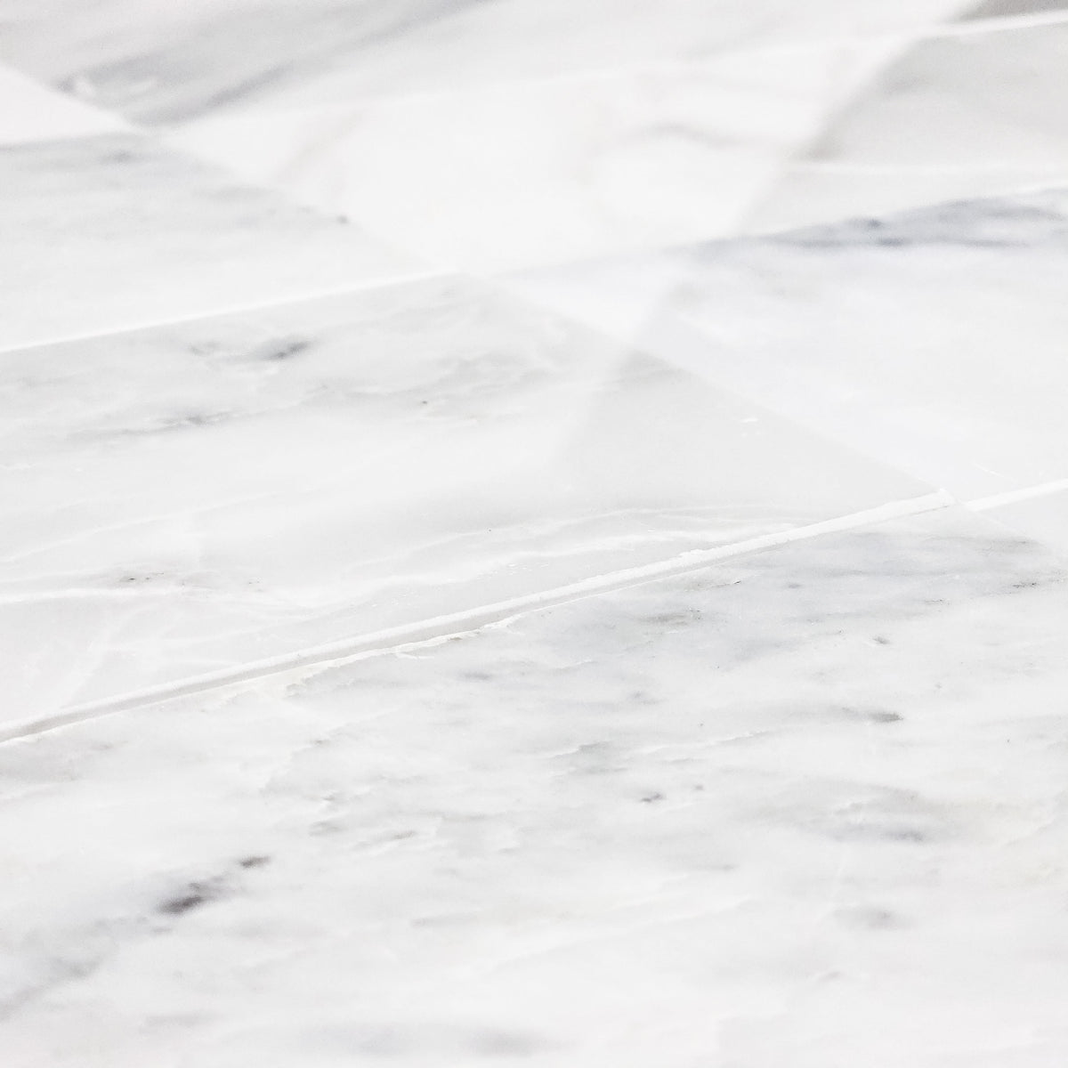 Elon Tile Pearl White Field Tile tile arrangement — available at Surface Group